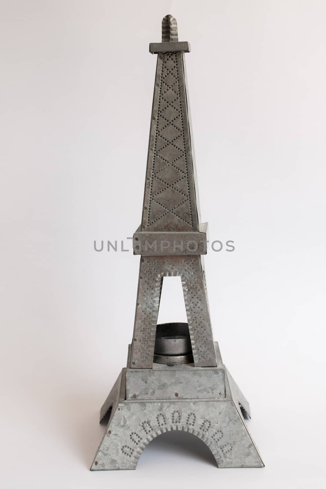 Model Eiffel Tower zinc white background.