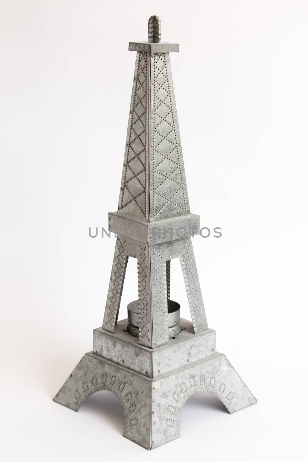 Model Eiffel Tower zinc white background.