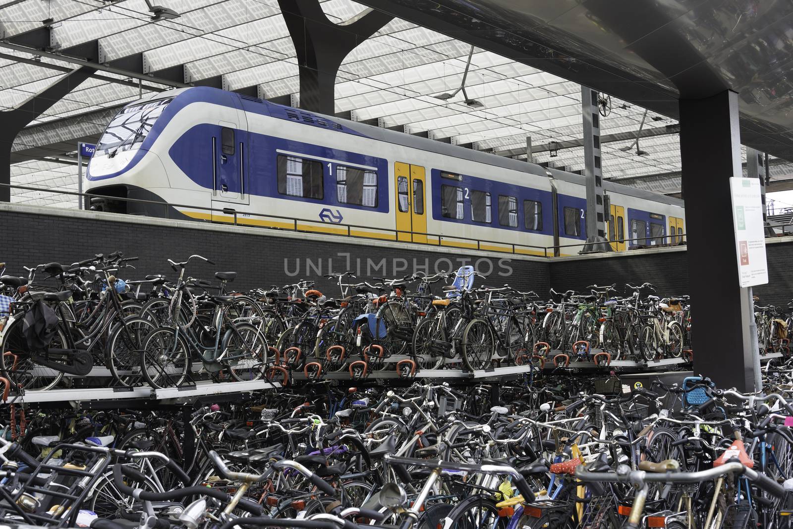 ROTTERDAM,HOLLAND-MAY 18, new bicycle storage for thousand of bikes at the backsite of the new build rotterdam central station on May 18 2016 in Rotterrdam, this station is opened in end 2015