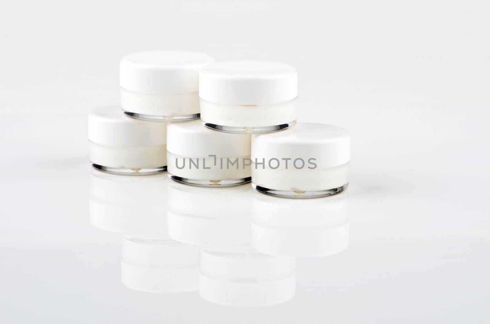 Blank white facial cream jar isolate on white background by dolnikow