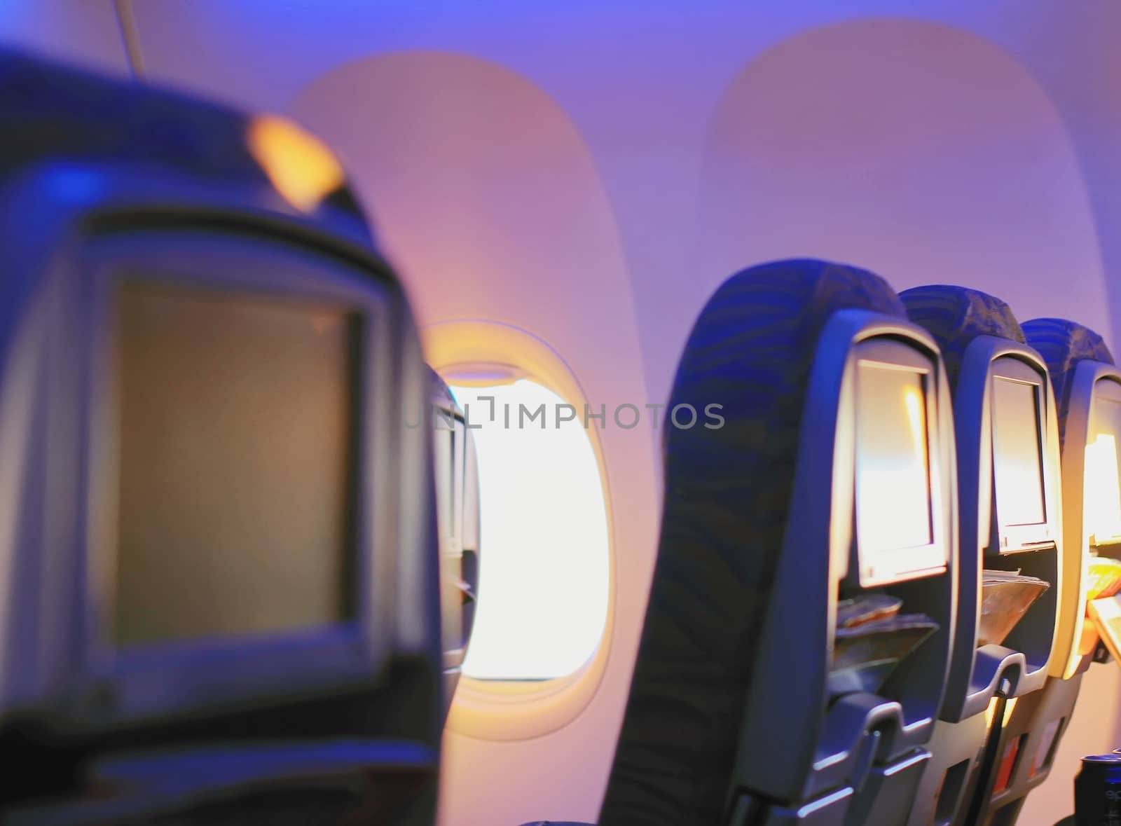 seats on the plane in sunny svte with magazines by KoliadzynskaIryna