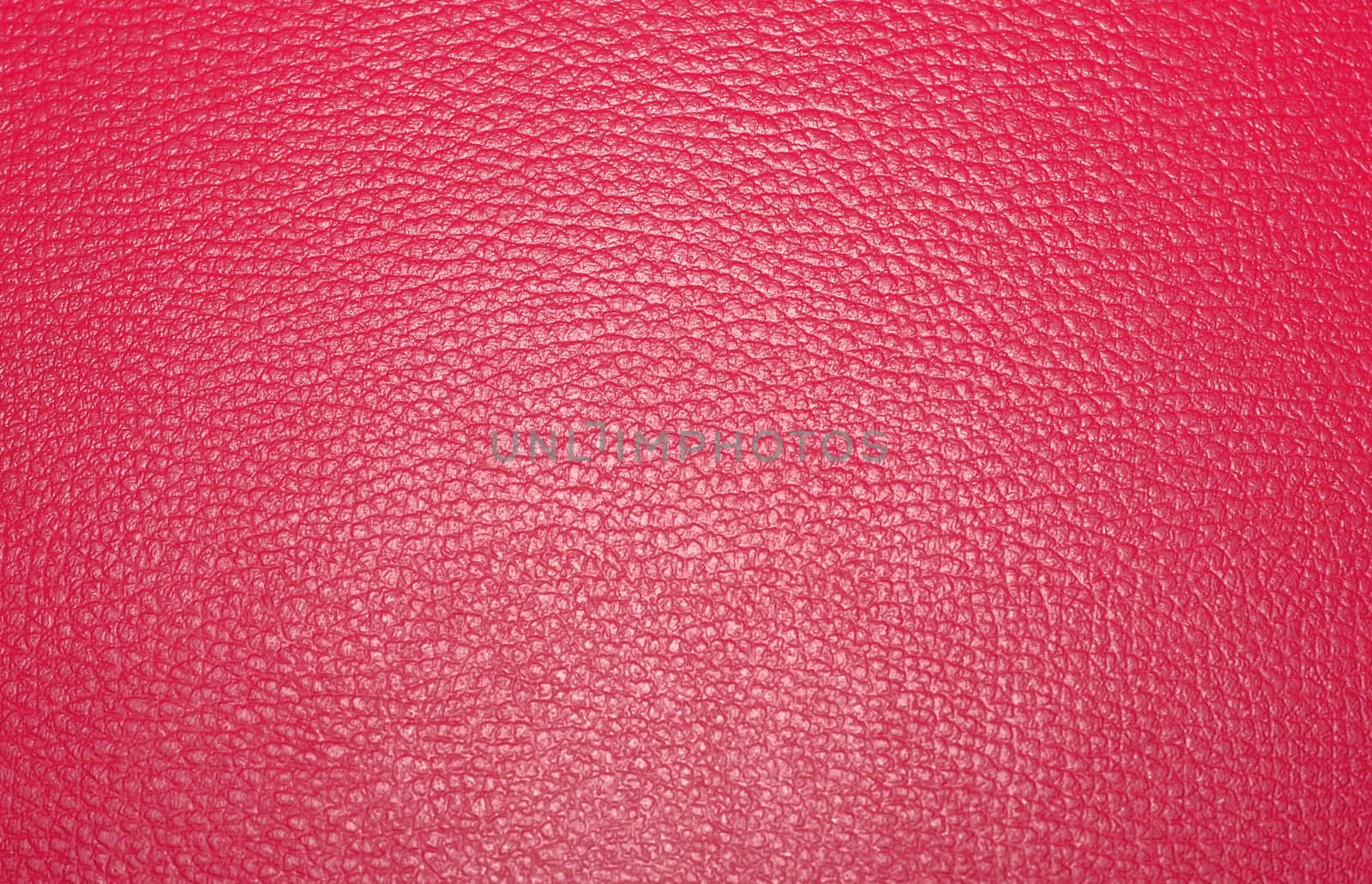 Texture colored leatherette red, for design and upholstery for decoration and fashion, for the background and tukstur