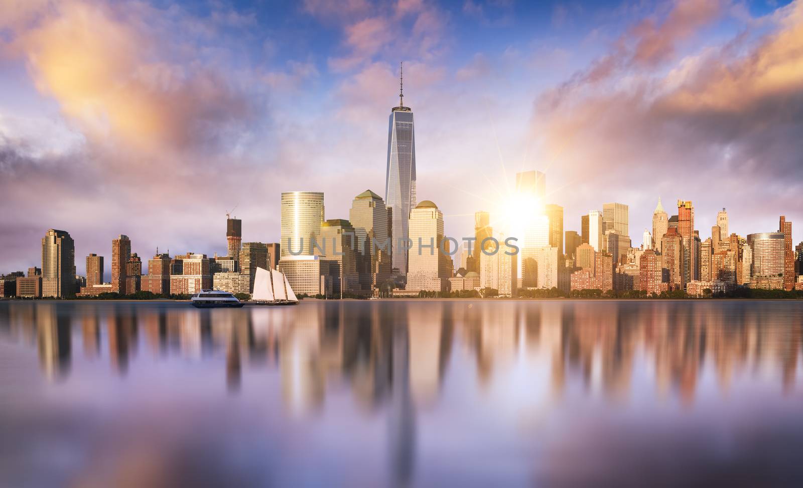 New York City skyline with urban skyscrapers at sunset, USA.