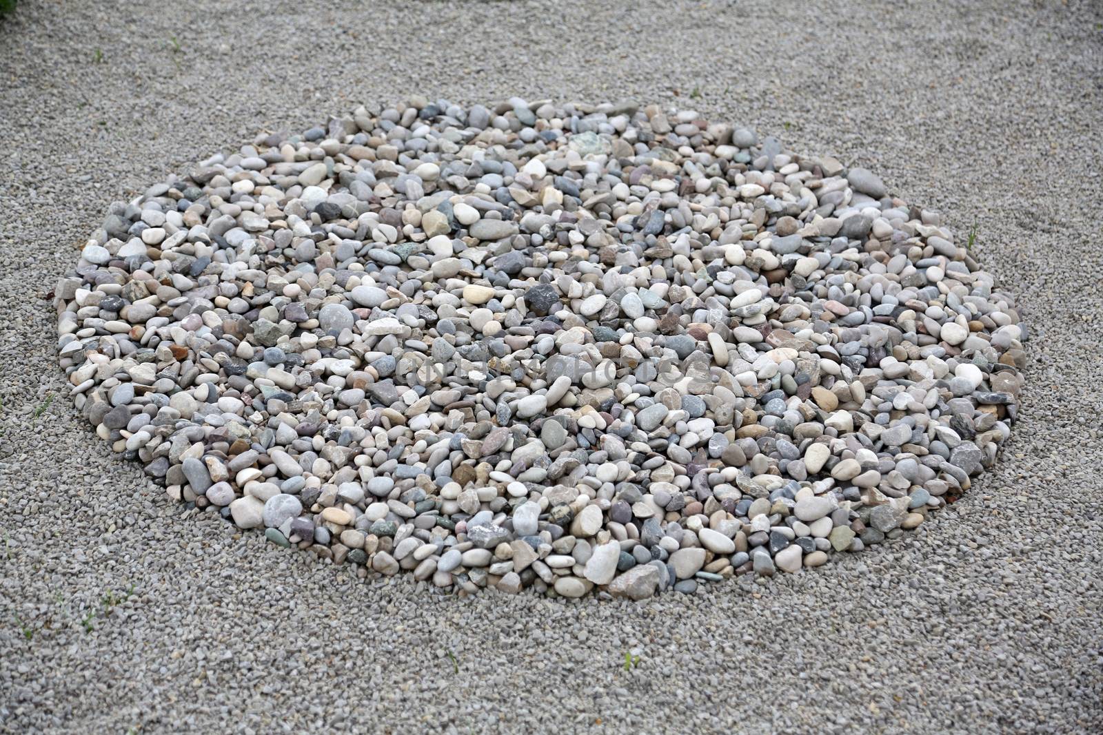 Garden design, with hard landscaping, using shaping, paving, rocks and pebbles