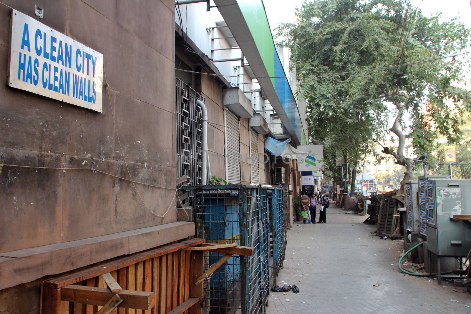 Clean city has clean walls inscription on the street in Kolkata, West Bengal, India on November 25, 2012.