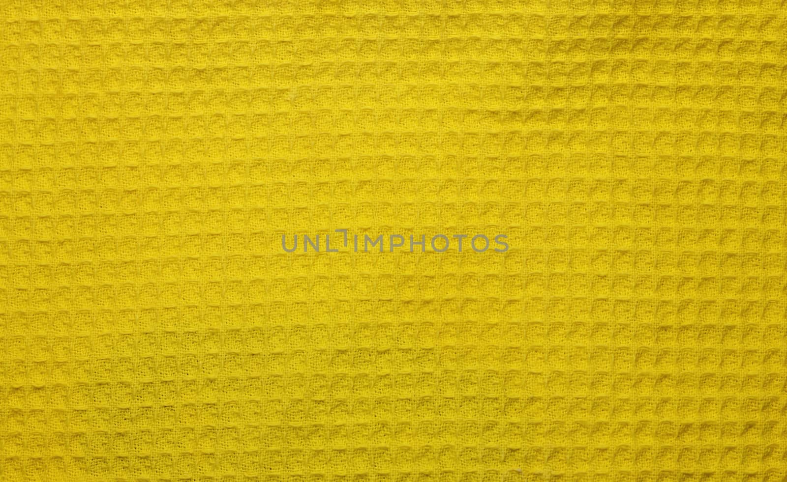 waffle cotton fabric texture background yellow abstract background, textured cloth towels