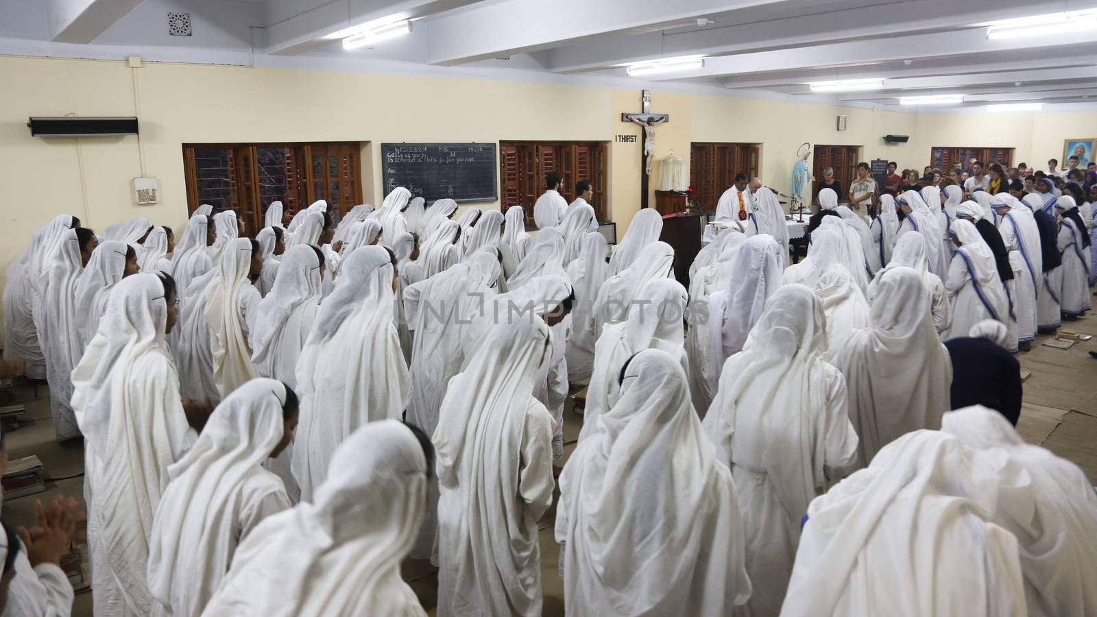 KOLKATA, INDIA - FEBRUARY 15: Sisters of The Missionaries of Charity of Mother Teresa at Mass in the chapel of the Mother House, Kolkata, India at February 15, 2014.