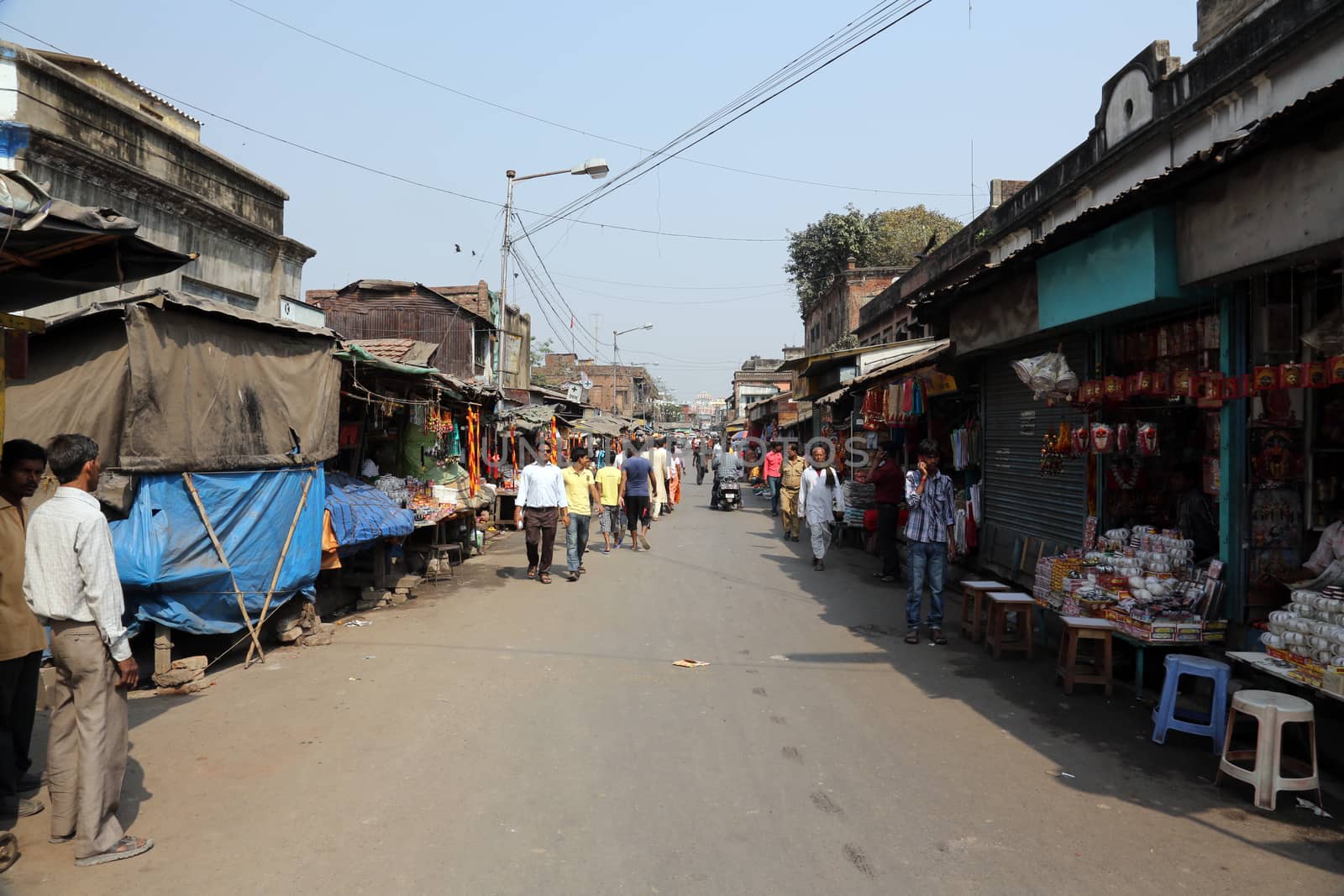 Tourists and visitors of famous Kalighat Kali Temple have rest near the shrine on February 10, 2014 in Kolkata. The name Calcutta to have been derived from the word Kalighat