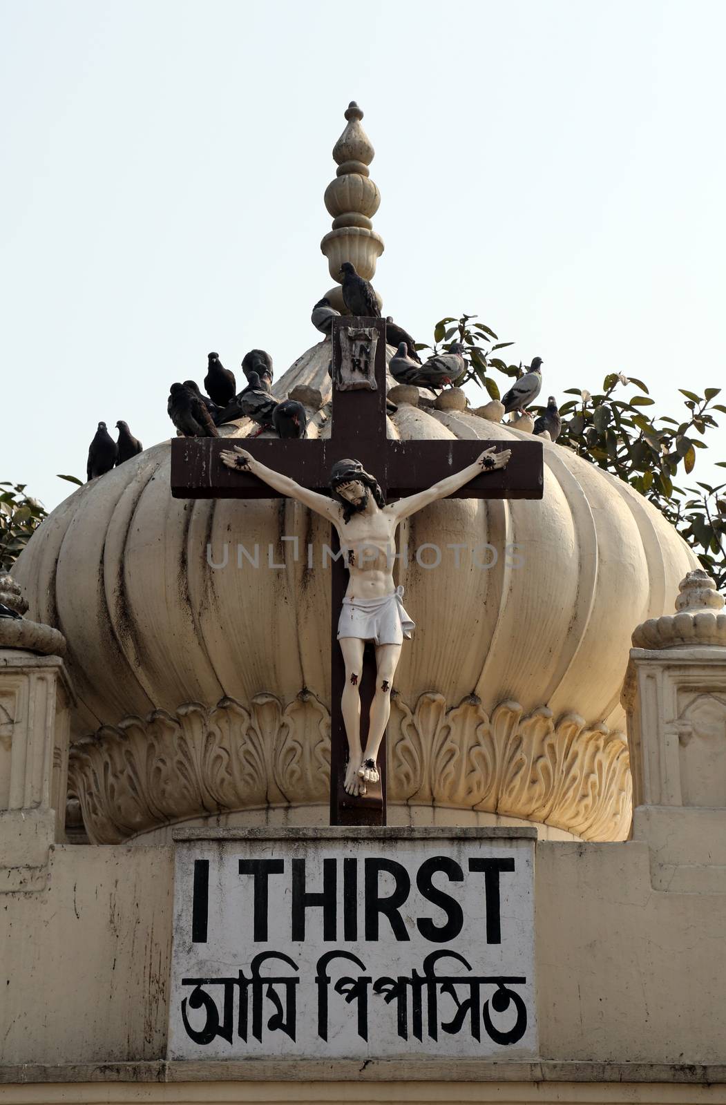 Crucifix on top of the Nirmal Hriday, Home for the Sick and Dying Destitutes, one of the buildings established by the Mother Teresa and run by the Missionaries of Charity in Kolkata, India on February 10, 2014.