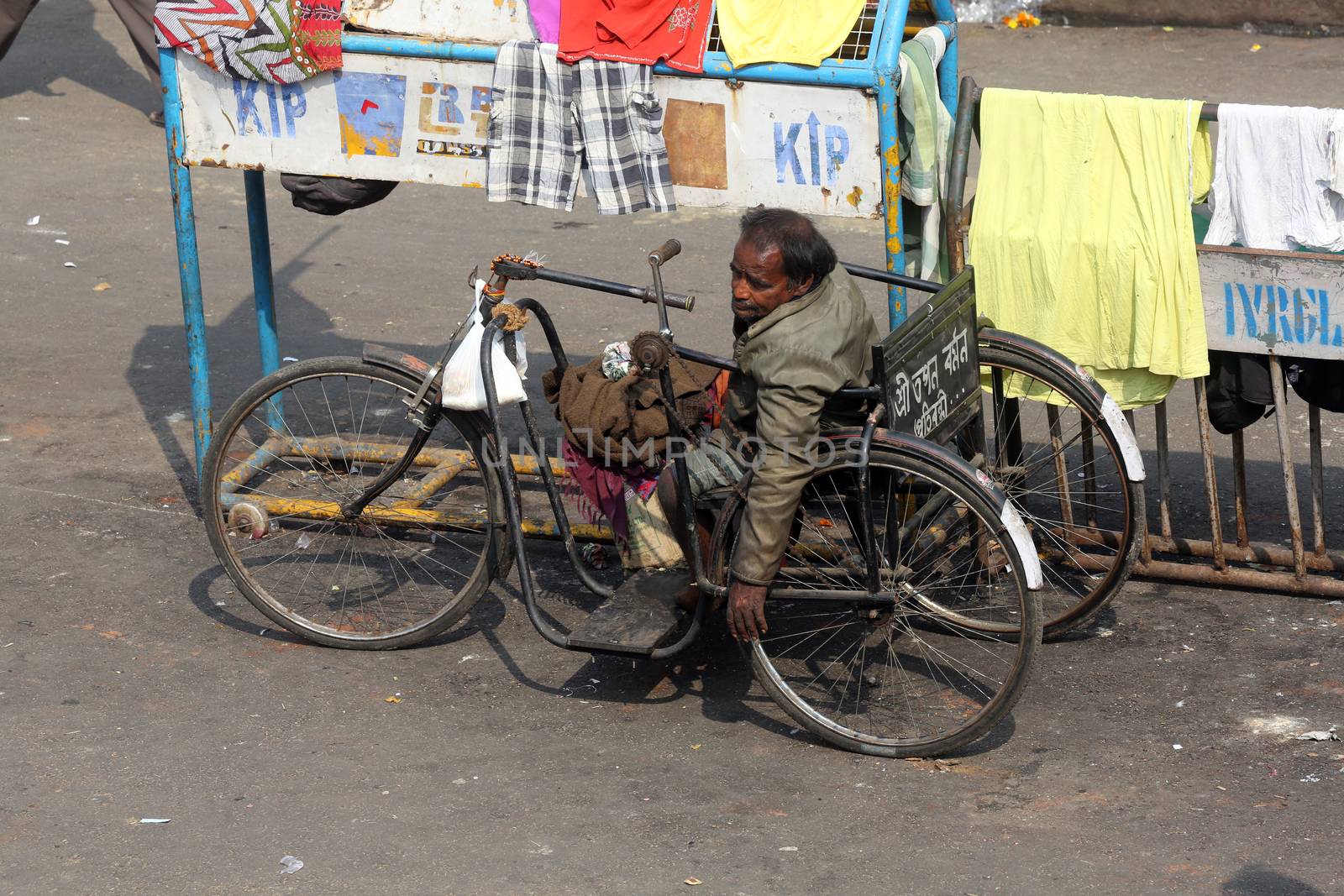 Beggars in front of Nirmal, Hriday, Home for the Sick and Dying Destitutes in Kolkata by atlas