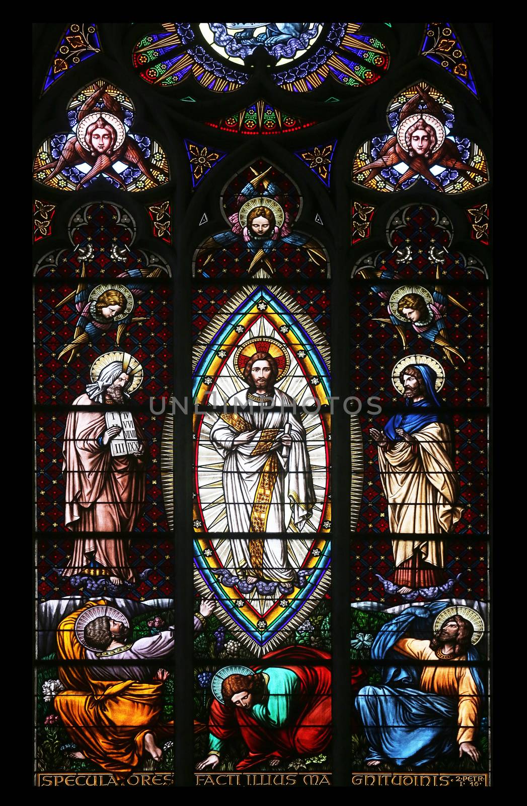 Transfiguration on Mount Tabor, Stained glass in Votiv Kirche (The Votive Church). It is a neo-Gothic church located on the Ringstrabe in Vienna, Austria on October 11, 2014