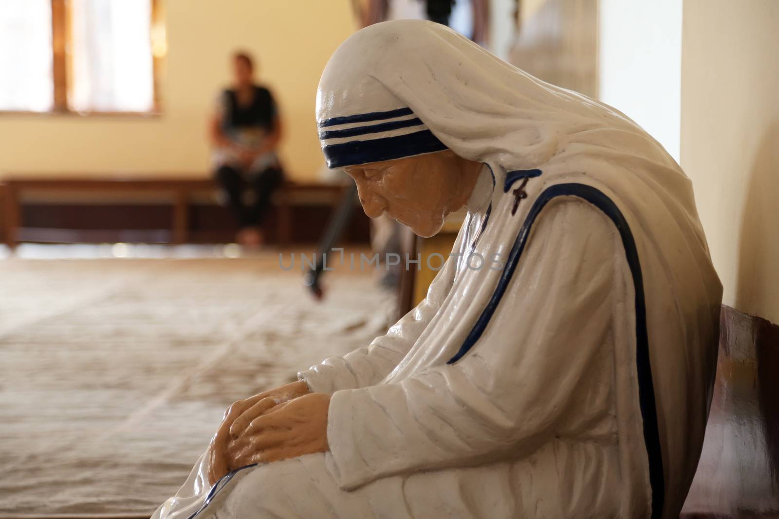 The statue of Mother Teresa in the chapel of the Mother House, Kolkata, India at 8 February 2014. The statue was made in the pose in which the Mother prayed.