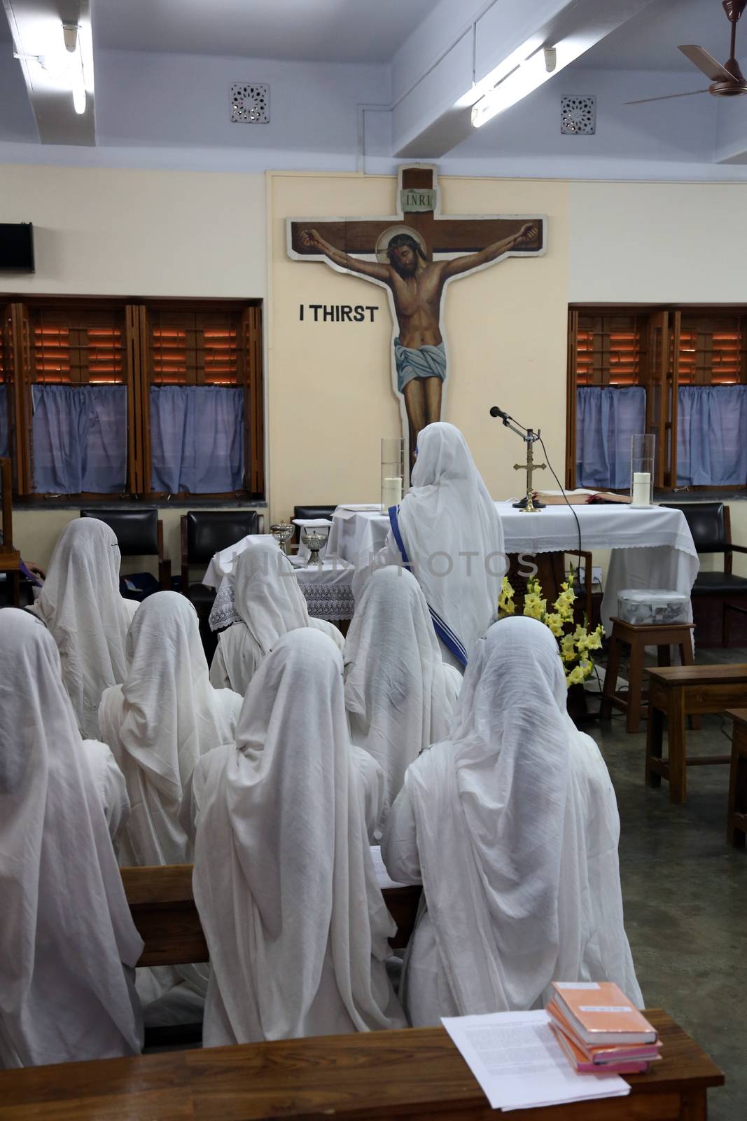 Sisters of Mother Teresa's Missionaries of Charity in prayer in the chapel of the Mother House, Kolkata, India at February 07, 2014.
