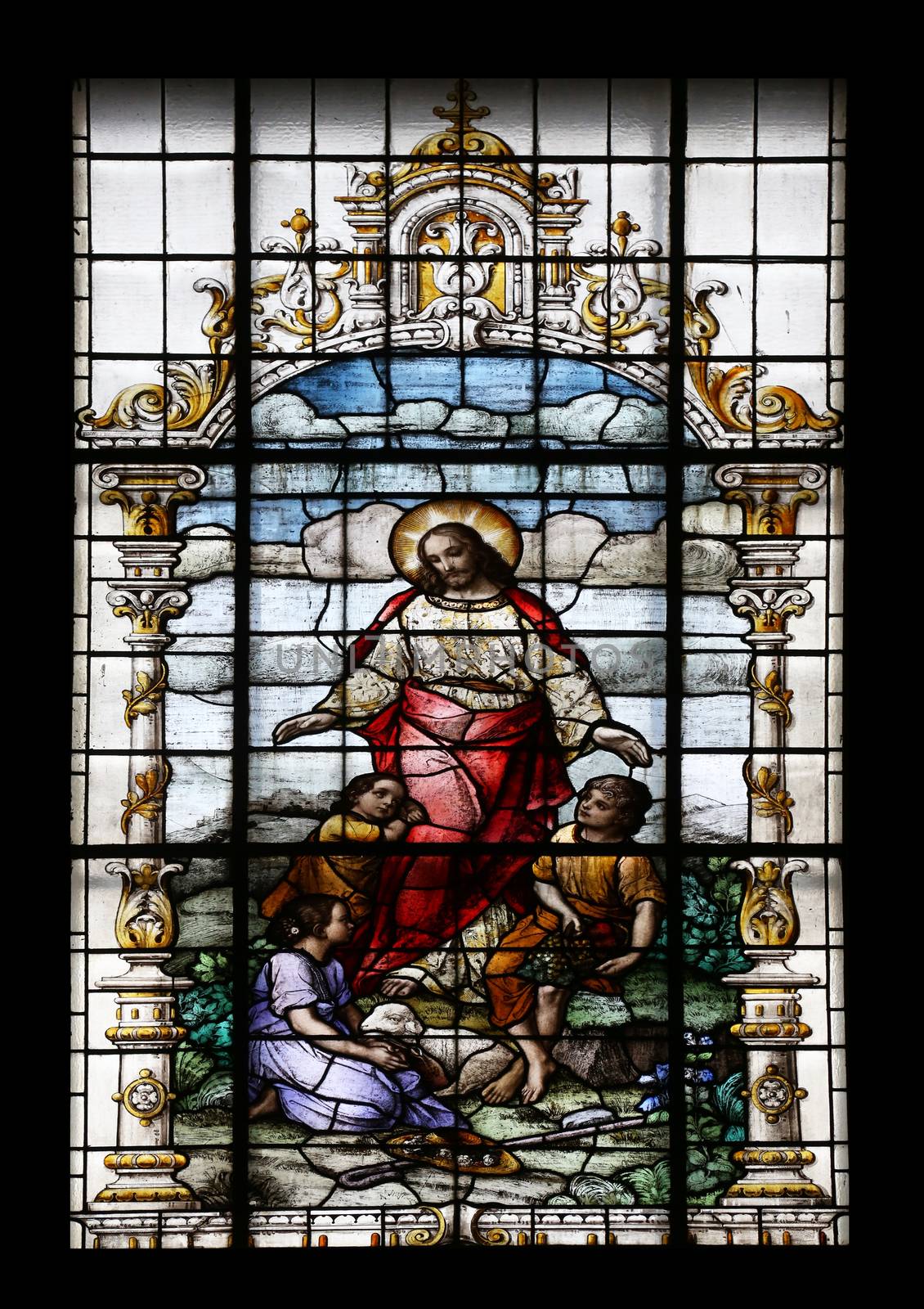 Jesus friend of the children, stained glass window in the Basilica of the Sacred Heart of Jesus in Zagreb, Croatia on December 27, 2013