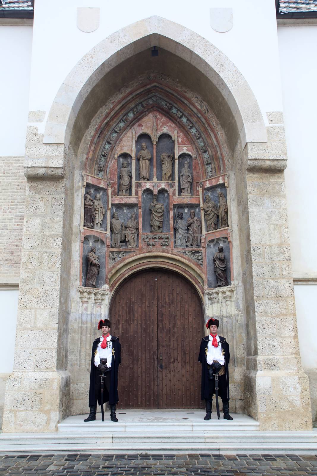 Guard of Honor of the Cravat Regiment on the south portal of the church of St. Mark in Zagreb, Croatia on September 20, 2014