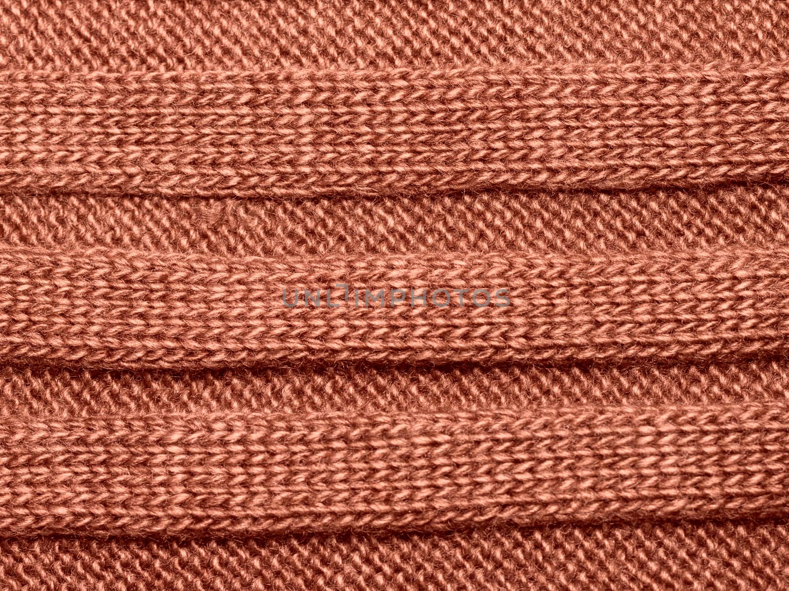 Brown ribbed knit wool like texture, textured fabrics knitted jersey, wool as a background pattern, upholstery