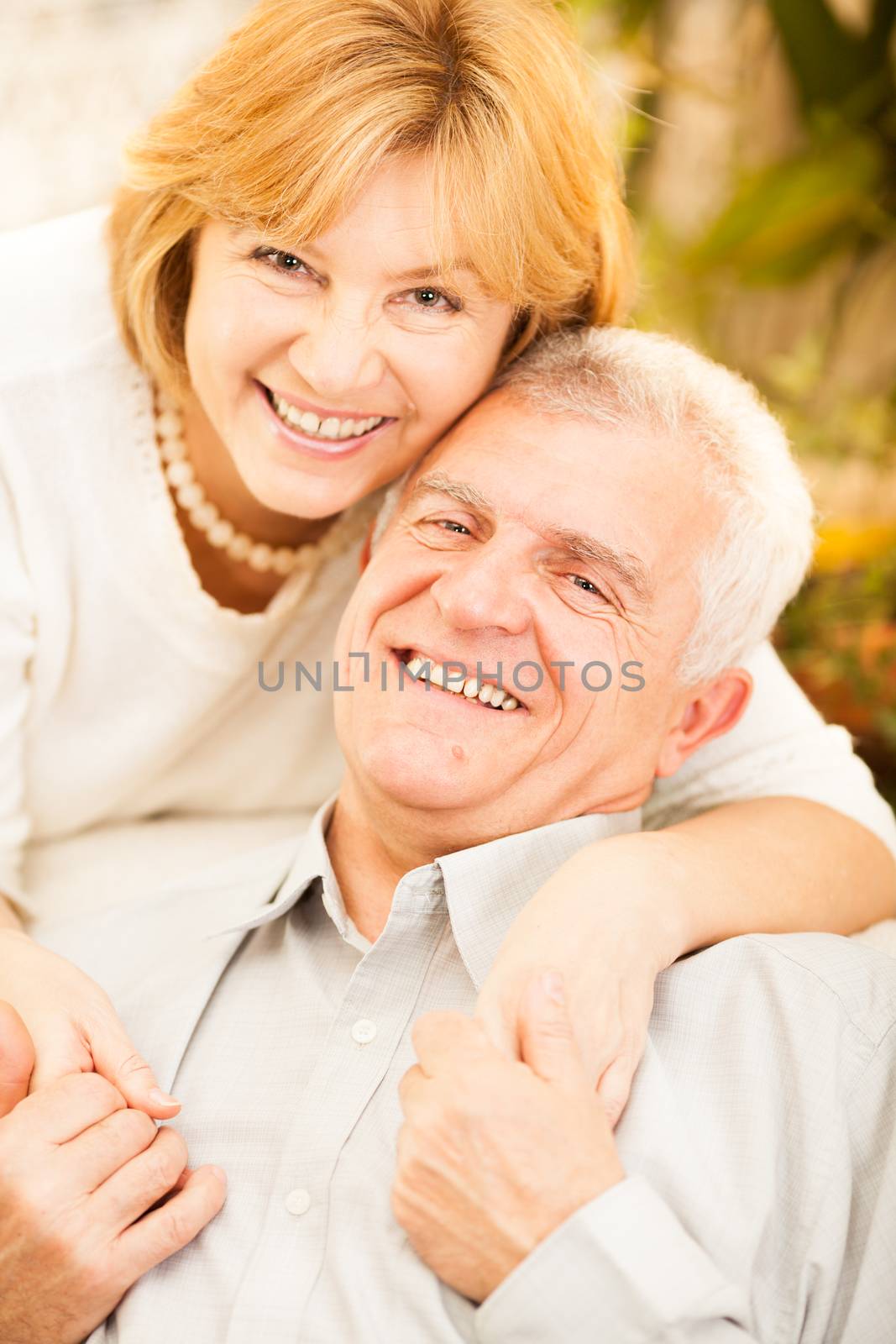 Portrait of happy senior couple in love