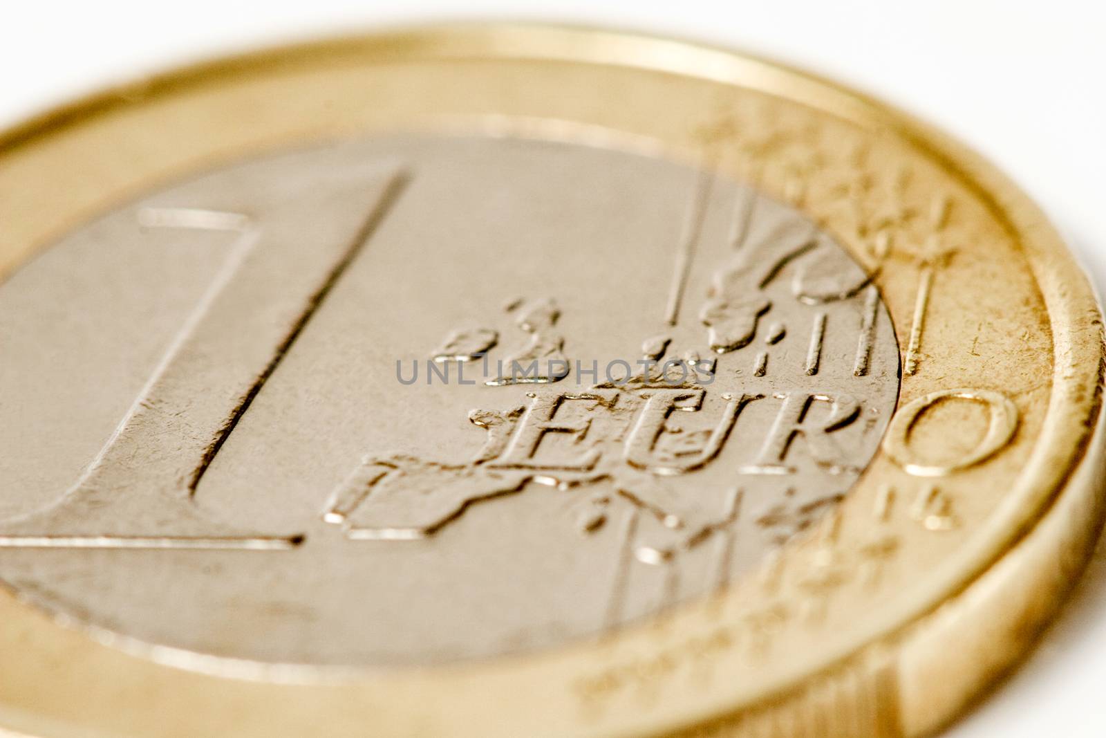 One euro coin macro on white