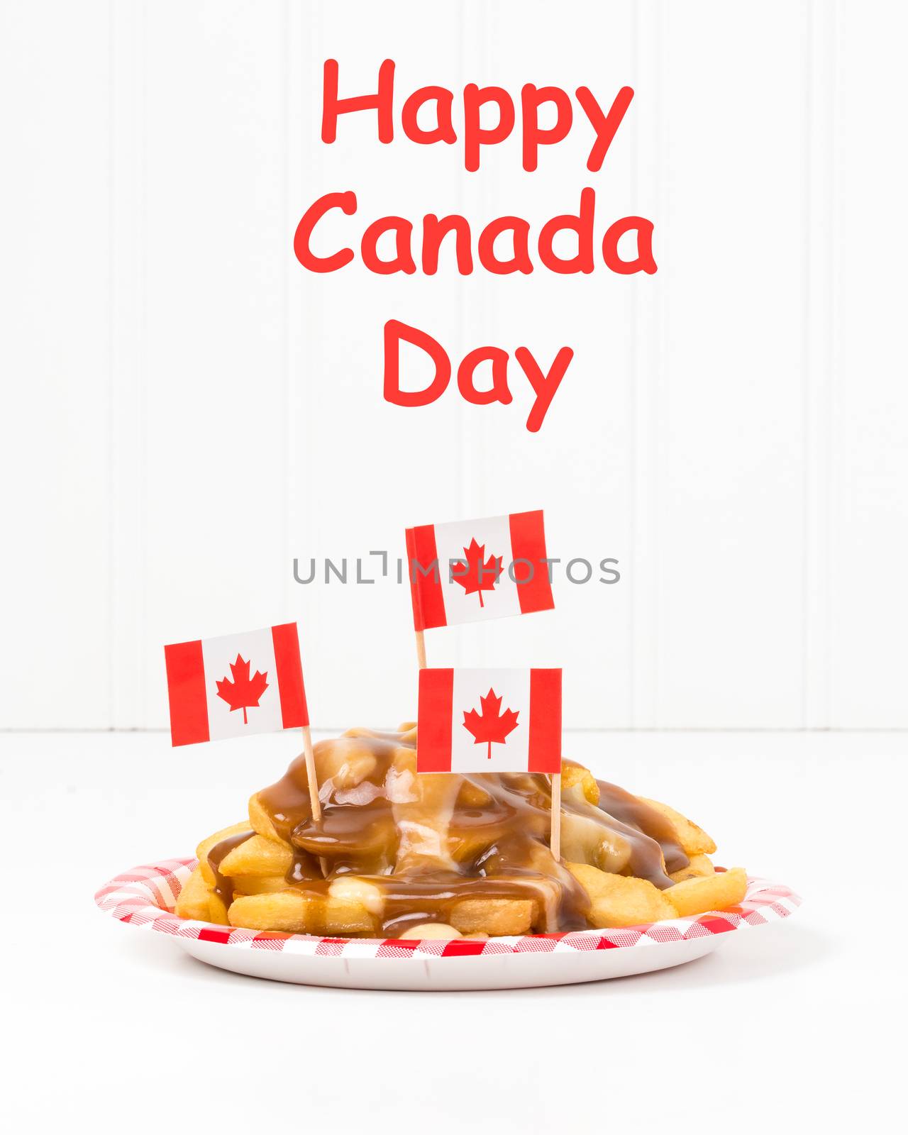 Plate of poutine, a unique Canadian fast food originating from the province of Quebec.