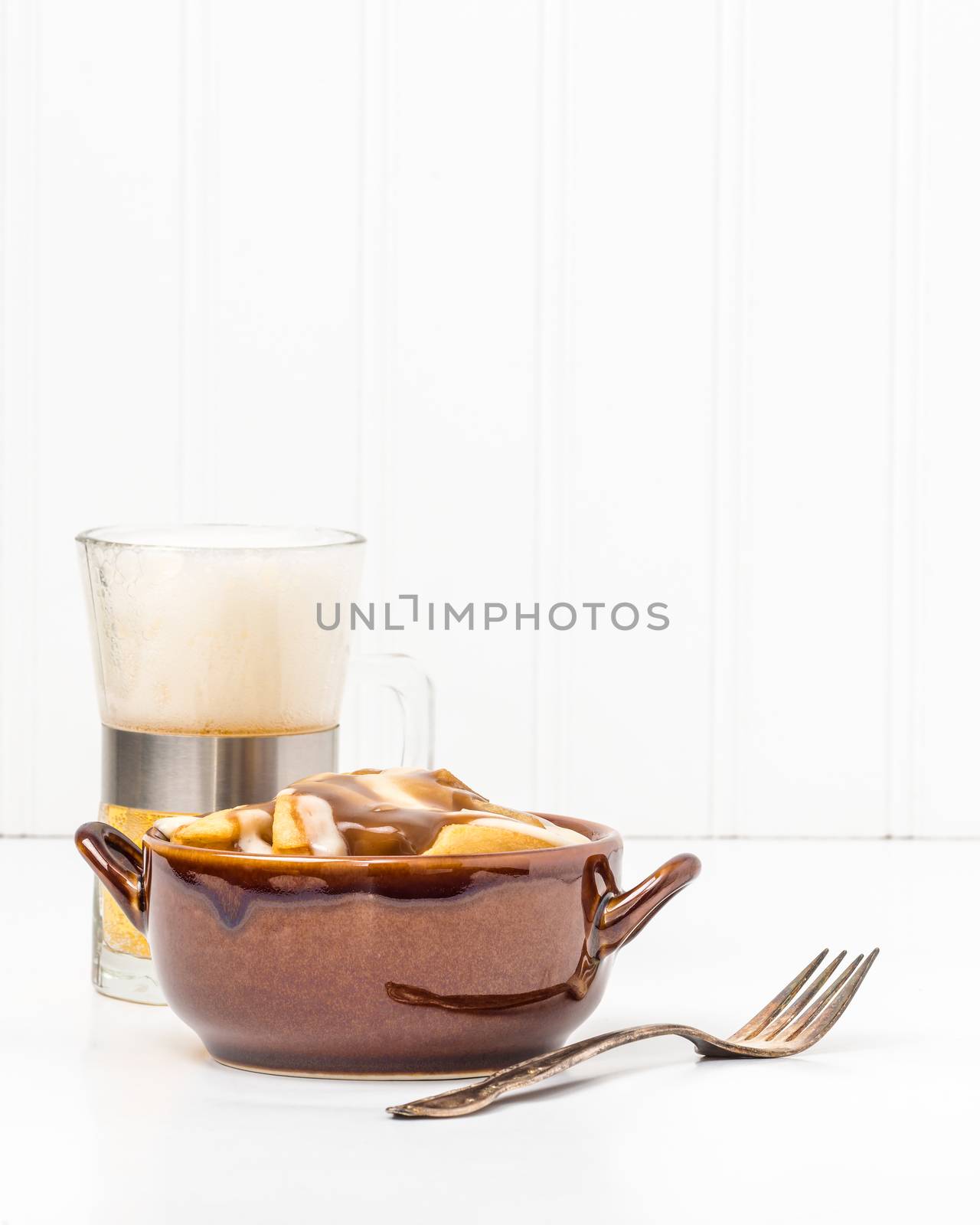 Bowl of poutine, a uniquely Canadian dish originating from the Province of Quebec.