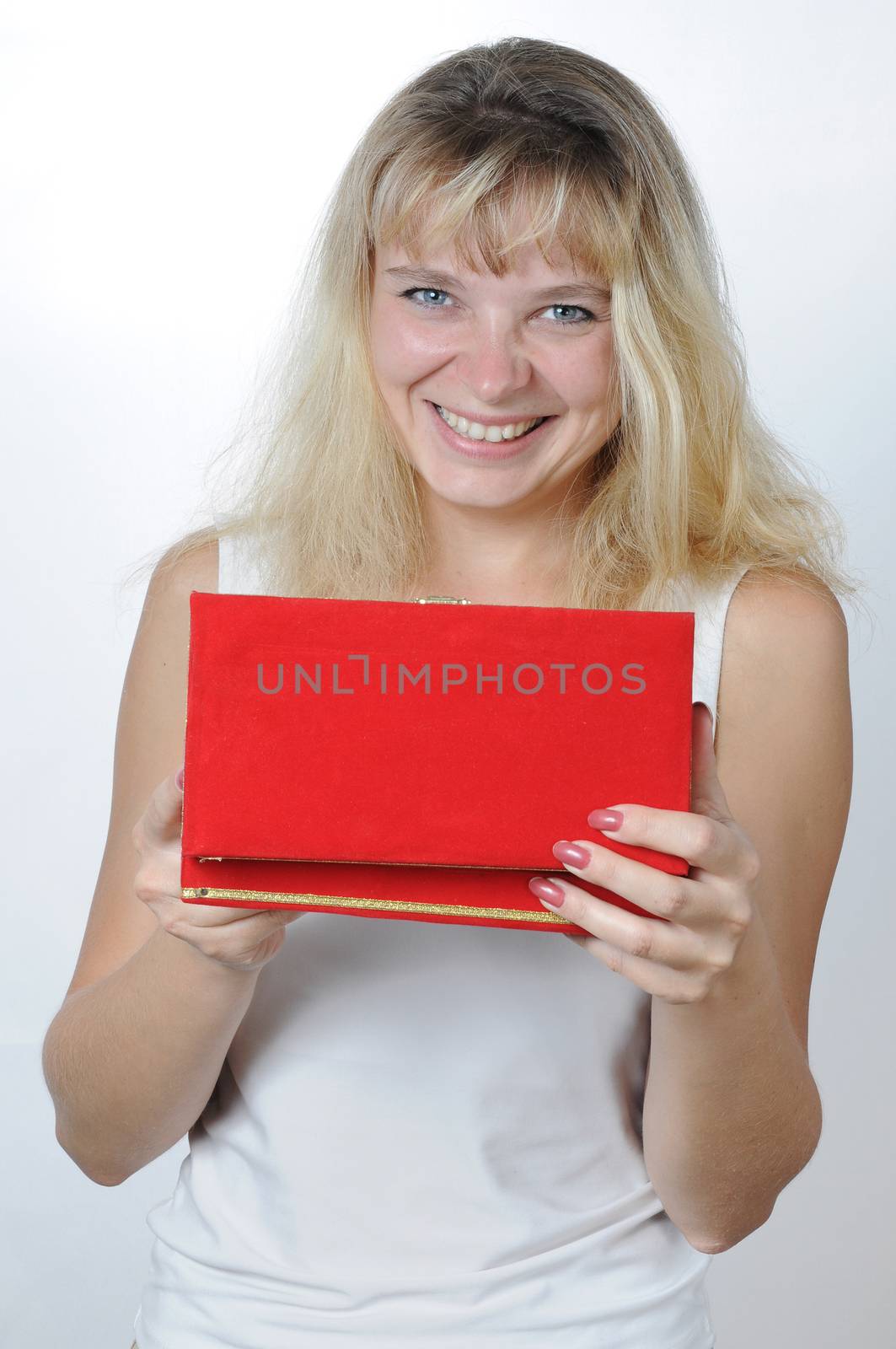 happy girl with gift box over white