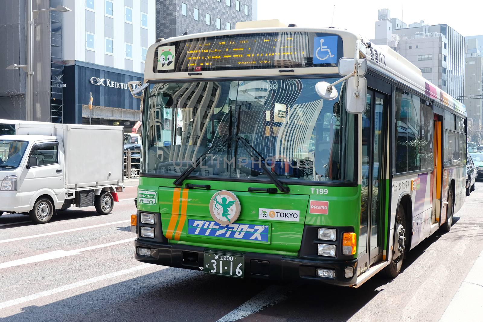 TOKYO, JAPAN -MARCH 29 2016: Commuter bus in the Shin-Ohashi-dori Street on MARCH 29, 2016 in Tokyo,Japan