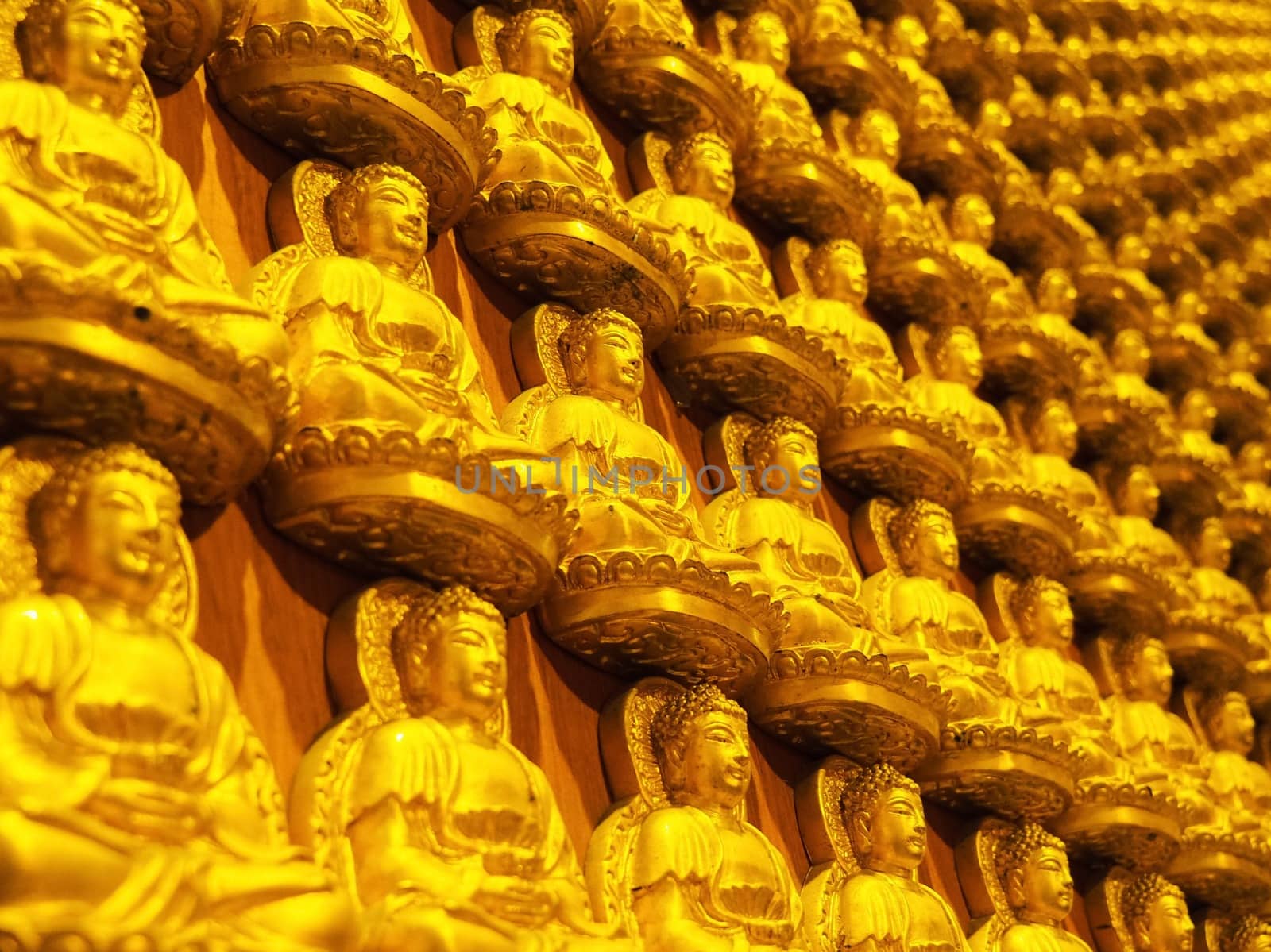 Rows Of Golden Buddha Statues At Barom Racha Kajanapisek Temple (Wat Leng Nei Yi 2), Nonthaburi Province, Thailand