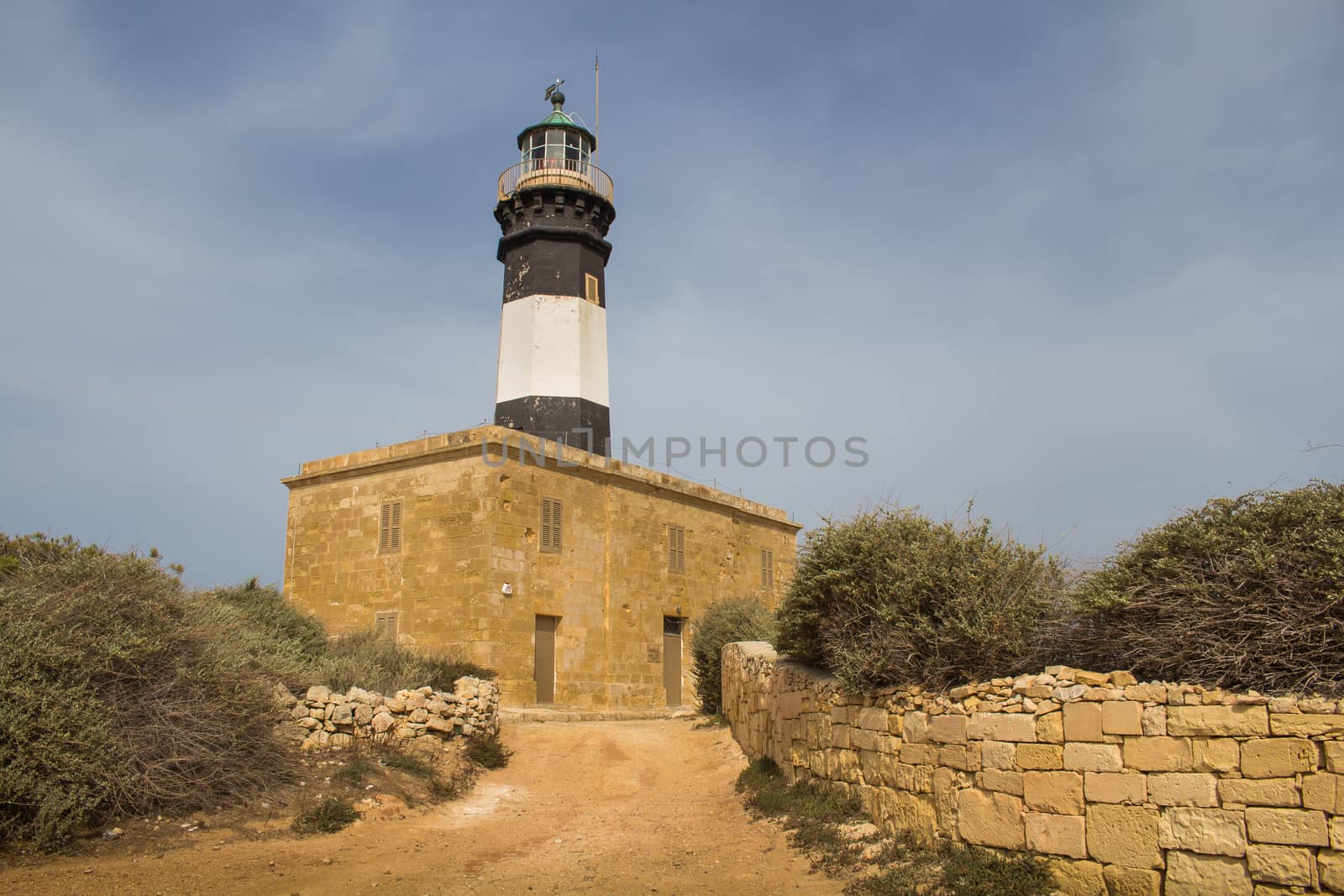 Lighthouse at Delimara Point, Malta by YassminPhoto