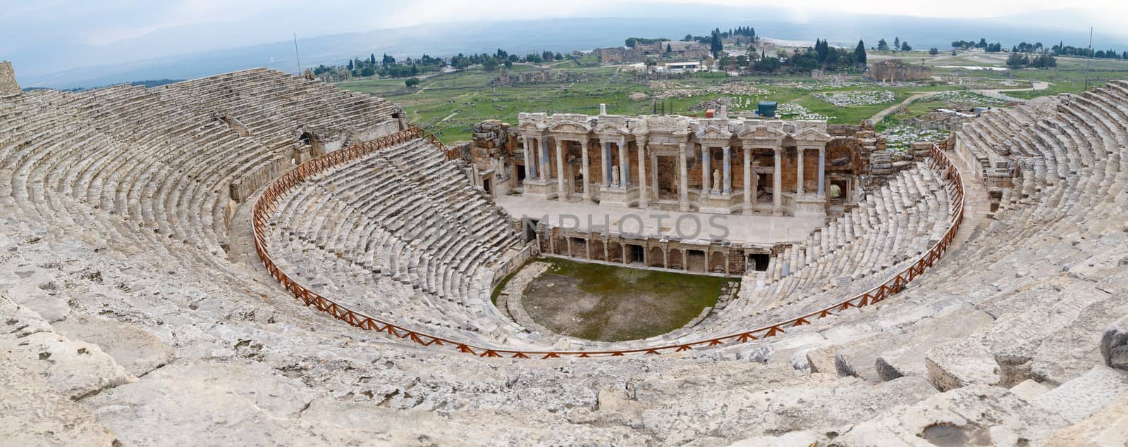 View of Hyerapolis Ancient City with a historical stone amphitheater.