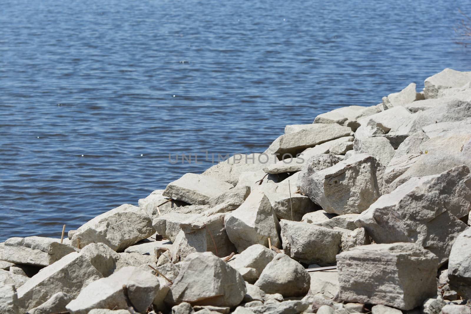 Lakeshore meets rocky beach