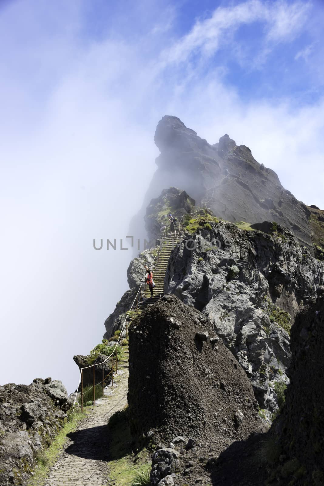 FUNCHAL,PORTUGAL-MARCH 24,unidentified people walking on the top of the pico arieiro mountains on march 24 2016 in Funchal,this mountain is one of the 2 highest on Madeira island