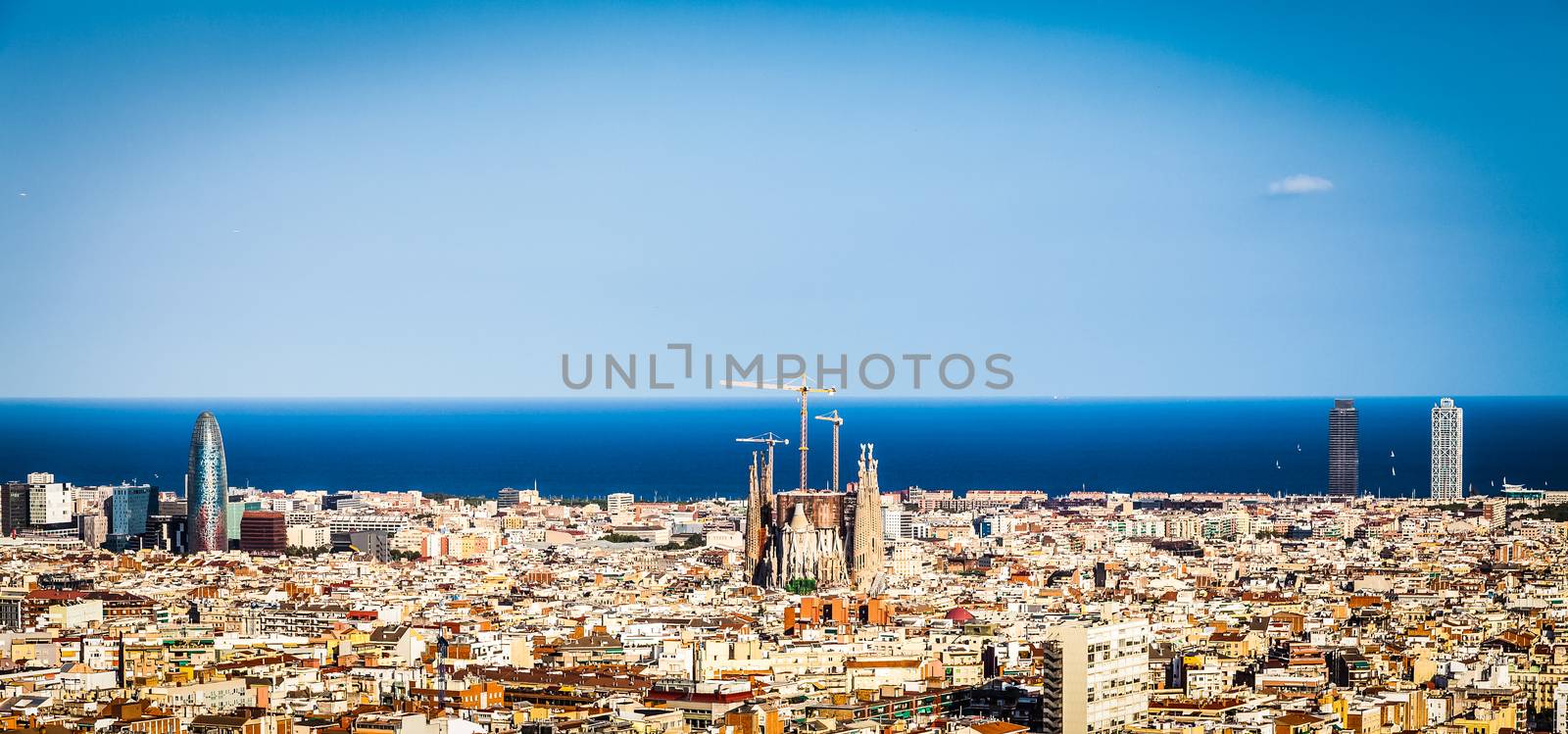 Barcelona - Spain. Wonderful blue sky during a sunny day on the city, with Sagrada Familia view.