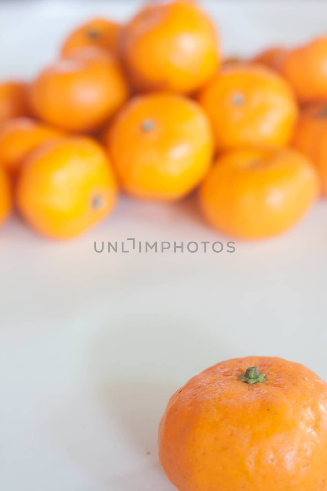 Small oranges grown in Thailand.