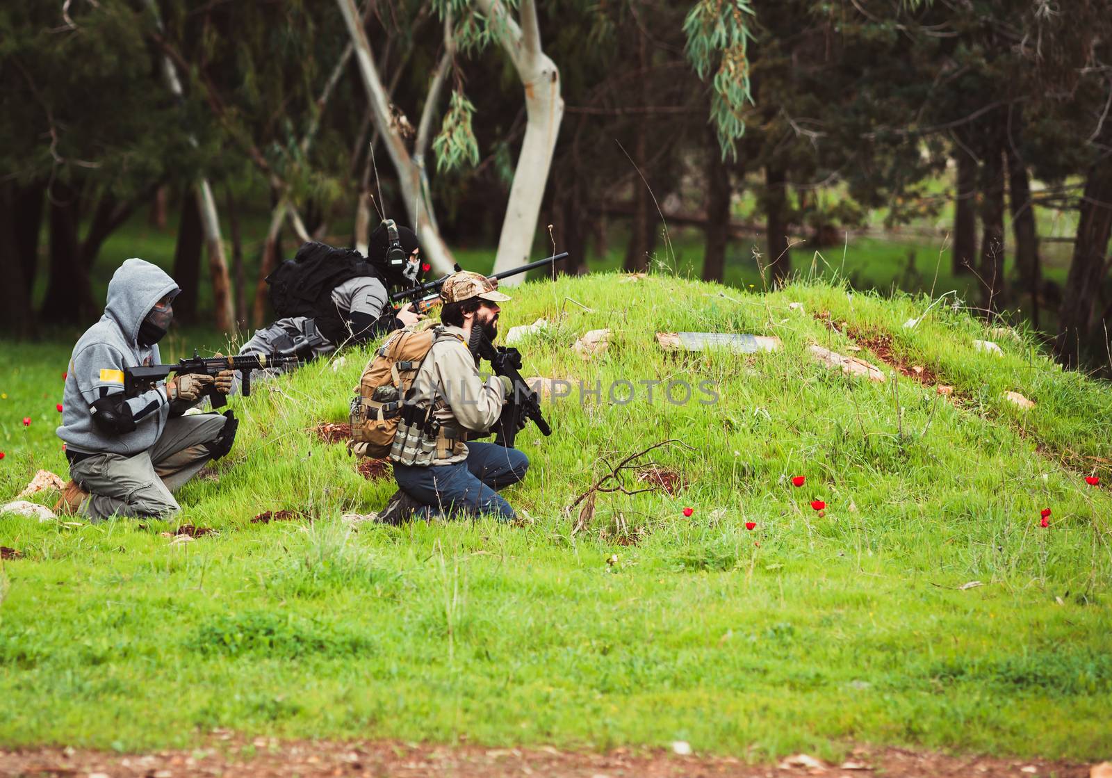 mens in military with weapon on a mission