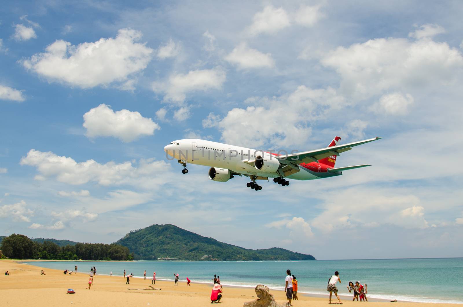 PHUKET - MAY 5 : Nordwind airlines airplane landing at Phuket International airport, runway near the beach, on May 5, 2016 Phuket, Thailand.