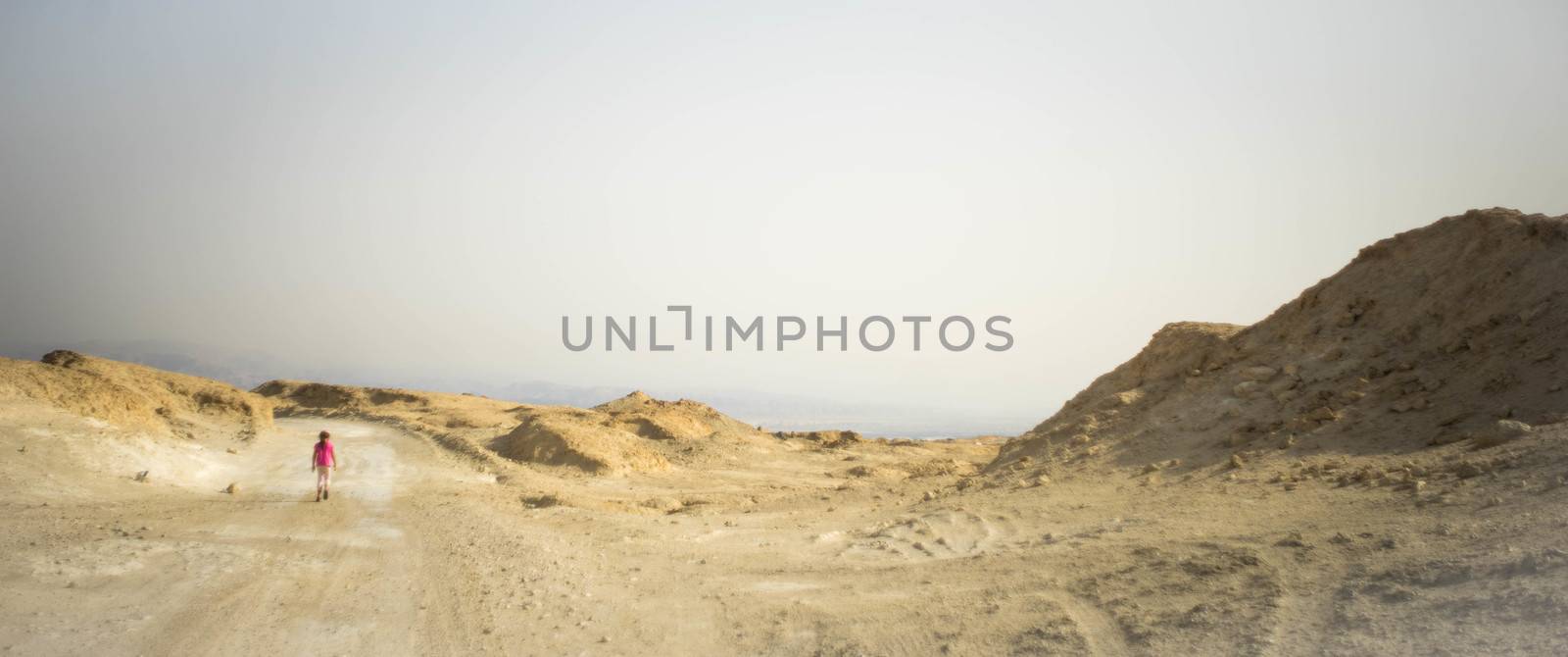 Family hiking in desert by javax