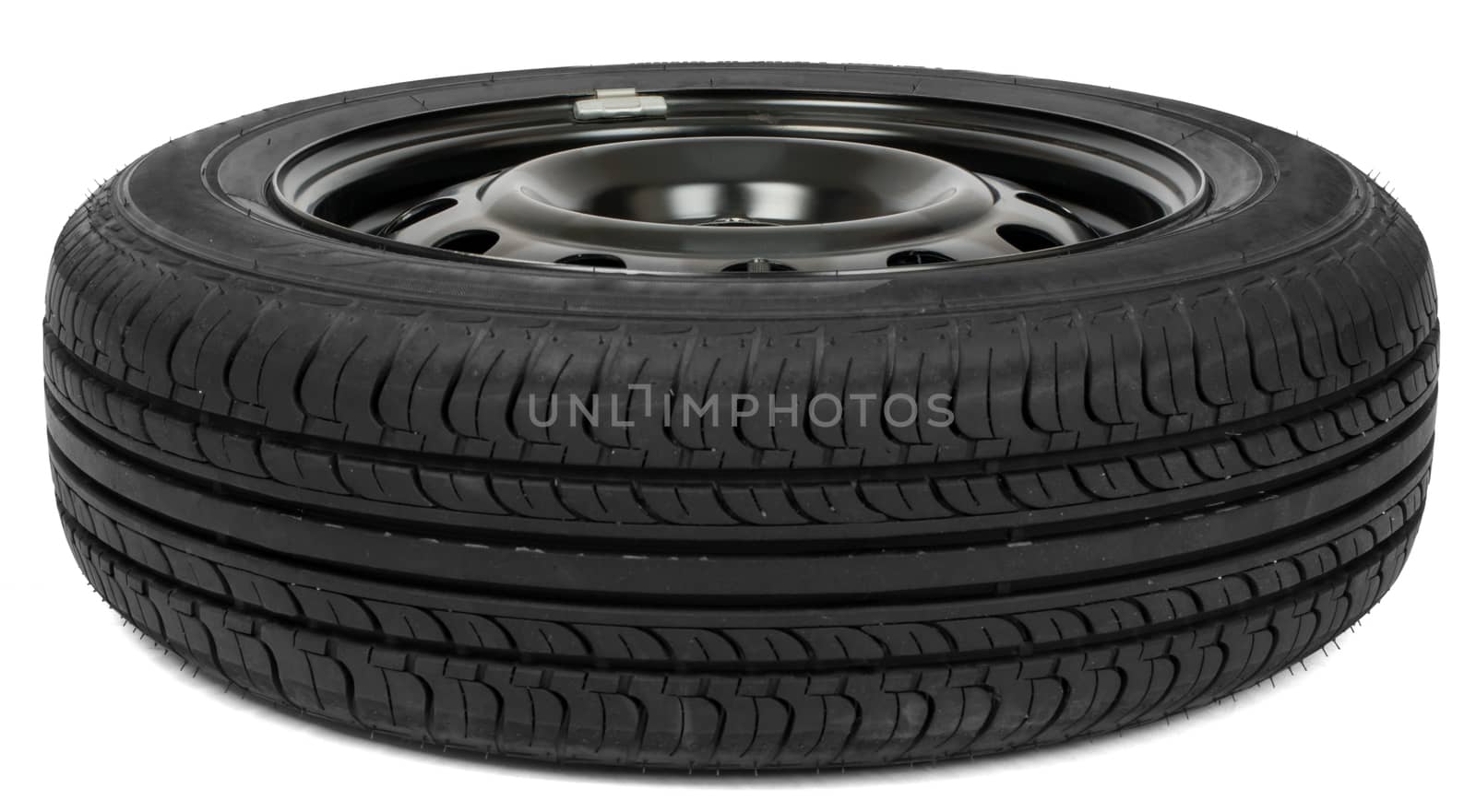 Car wheel on white background. Perspective view