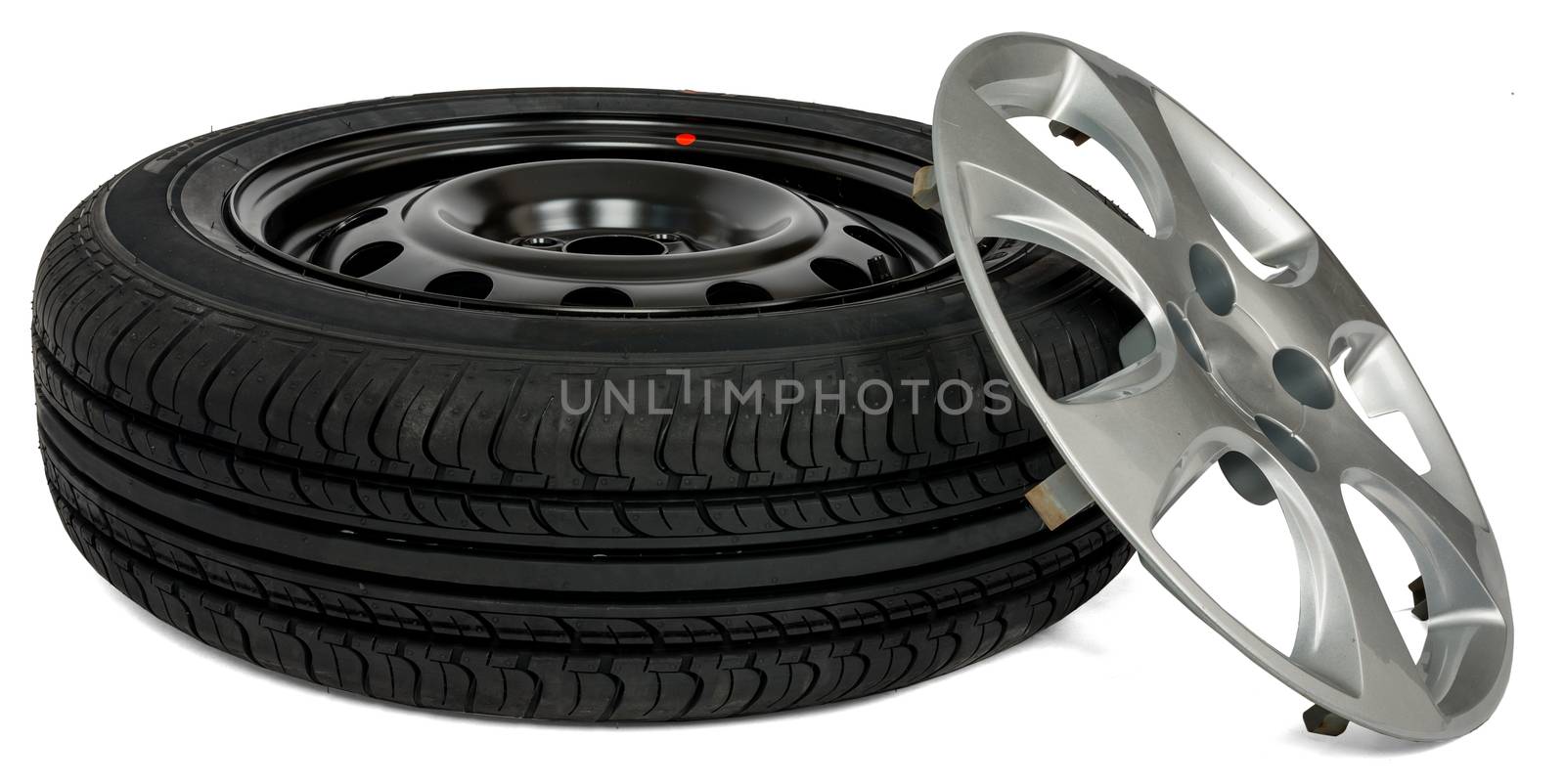 Car tire with wheel cap, white background