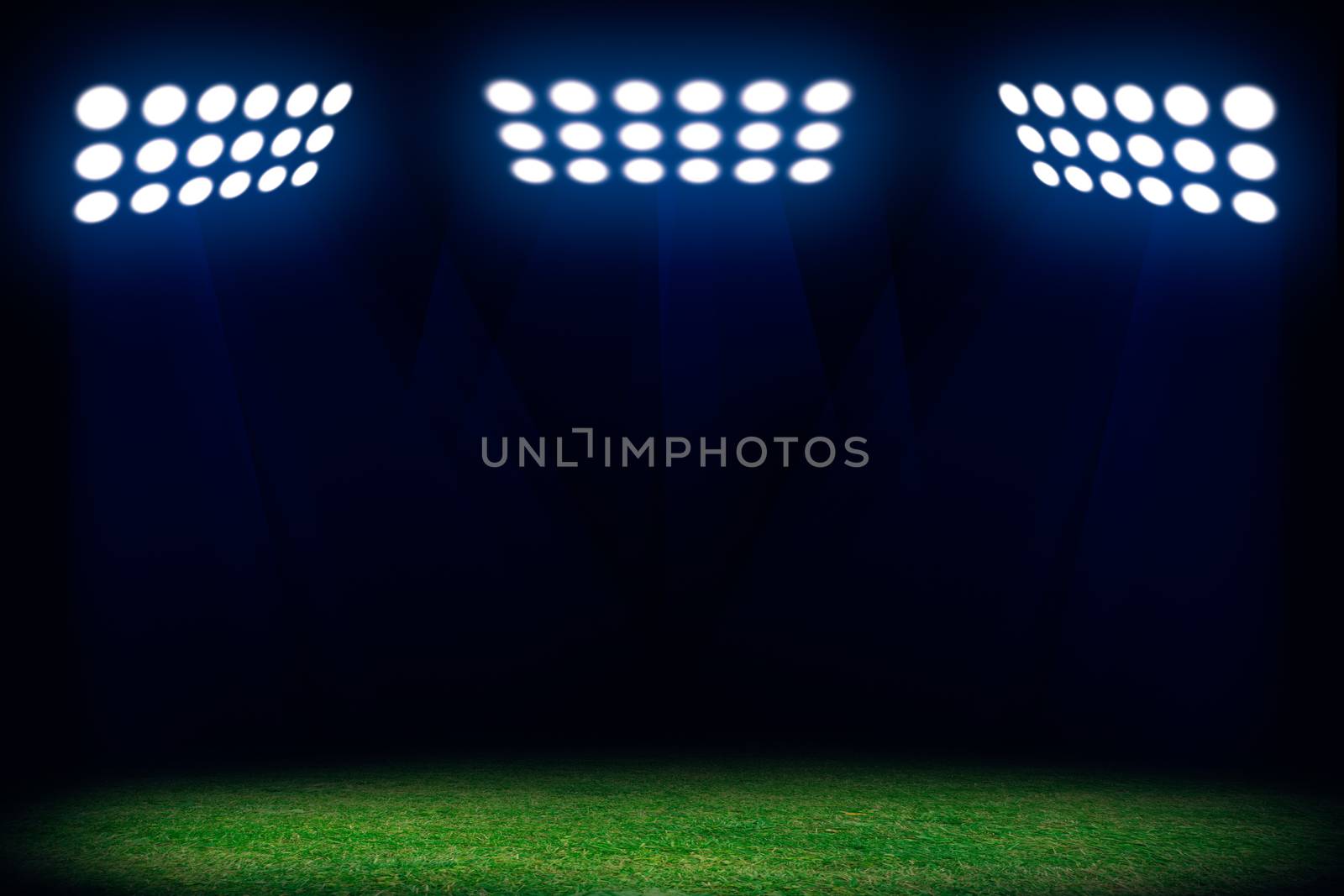Three spotlights on soccer field. Sport abstract background with copy space