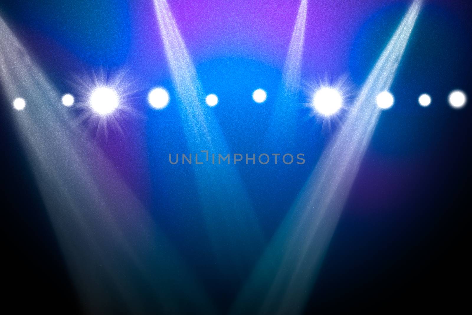 Abstract blue background with spotlights by cherezoff