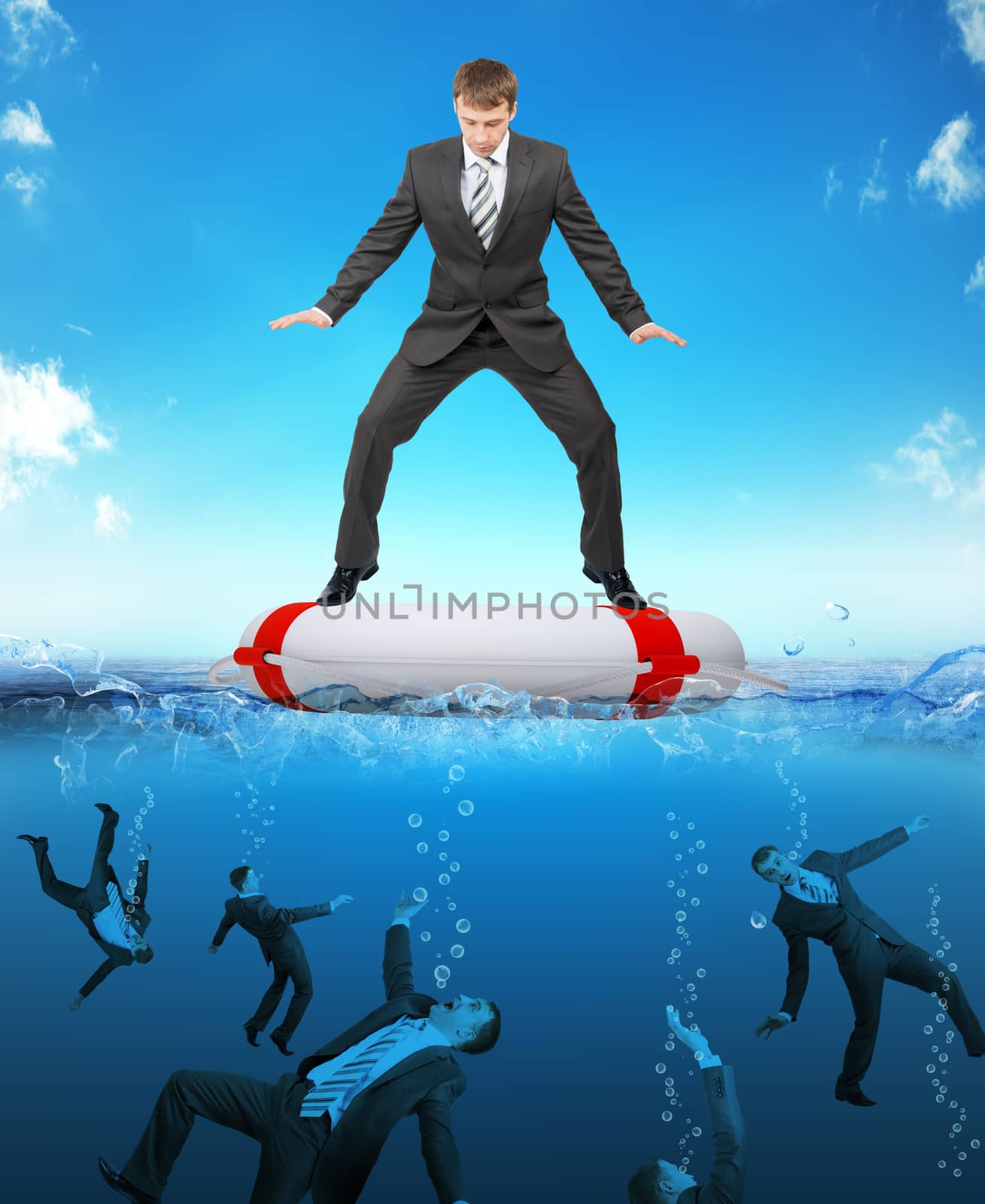 Businessman on lifebuoy with people drowning in sea