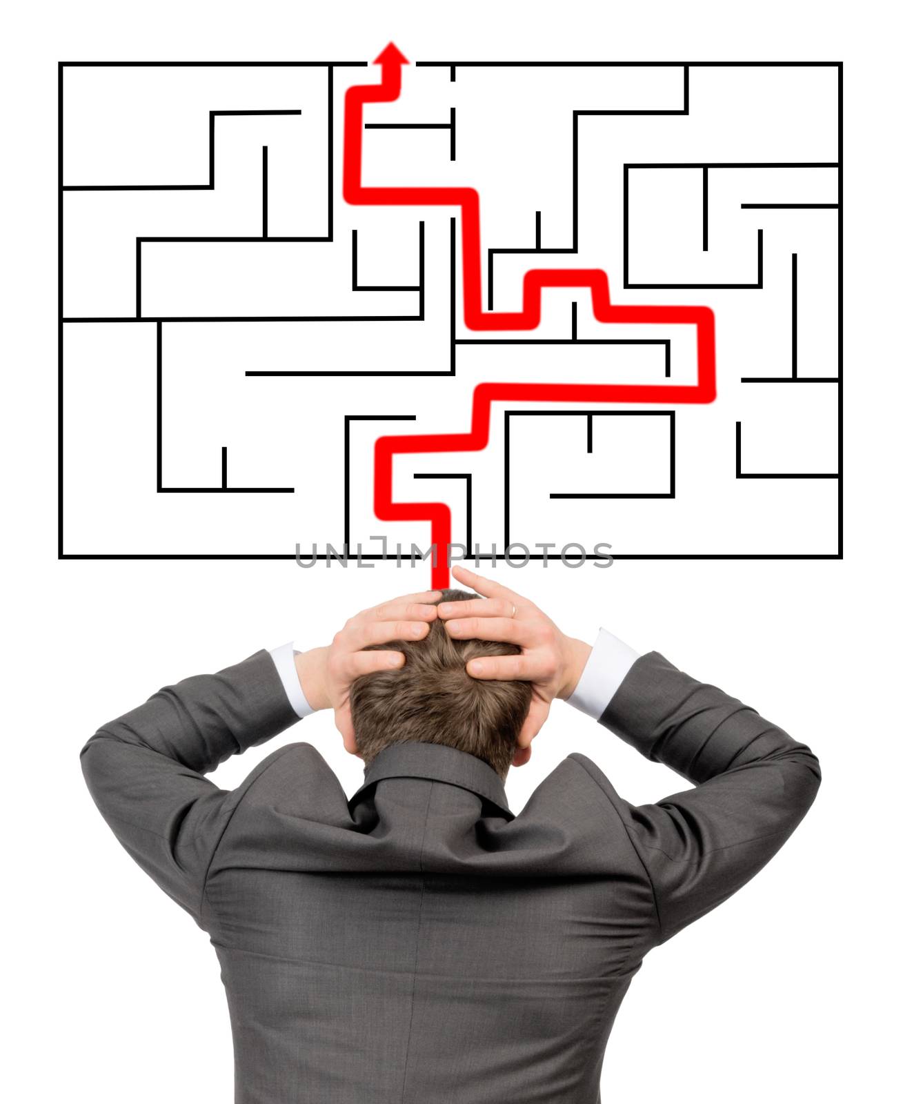 Confused businessman in front of labyrinth with red line showing the way out