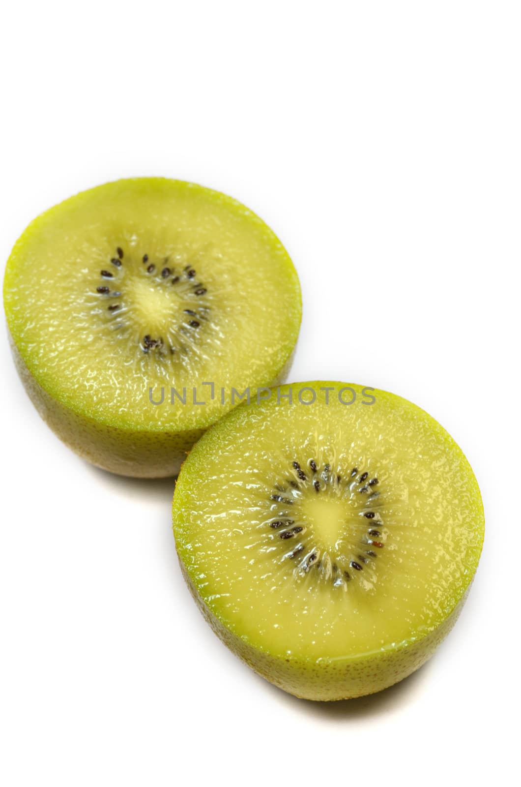 Yellow kiwi fruit on a white background
