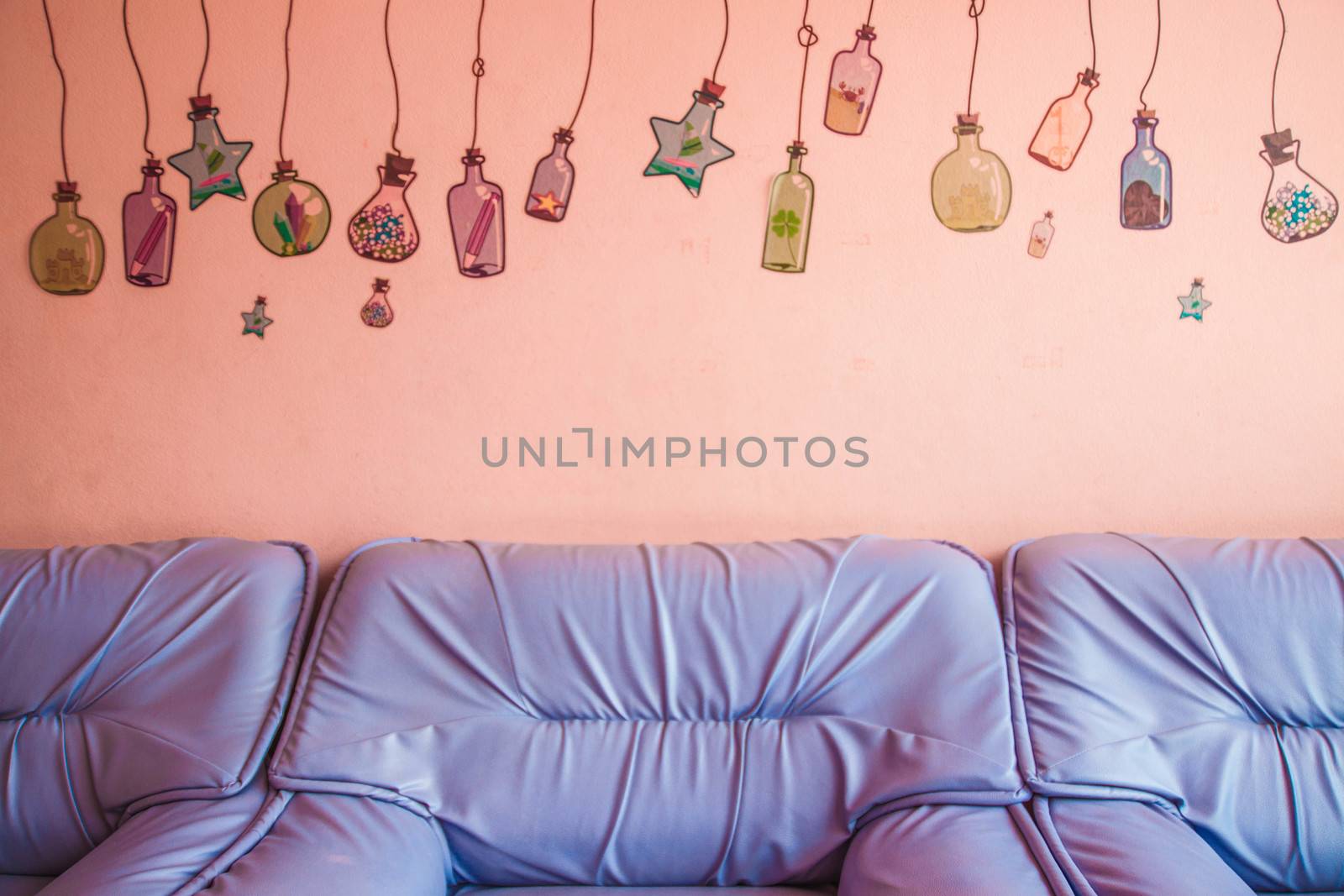Sofa wall purple, pink cocktails. And drinks