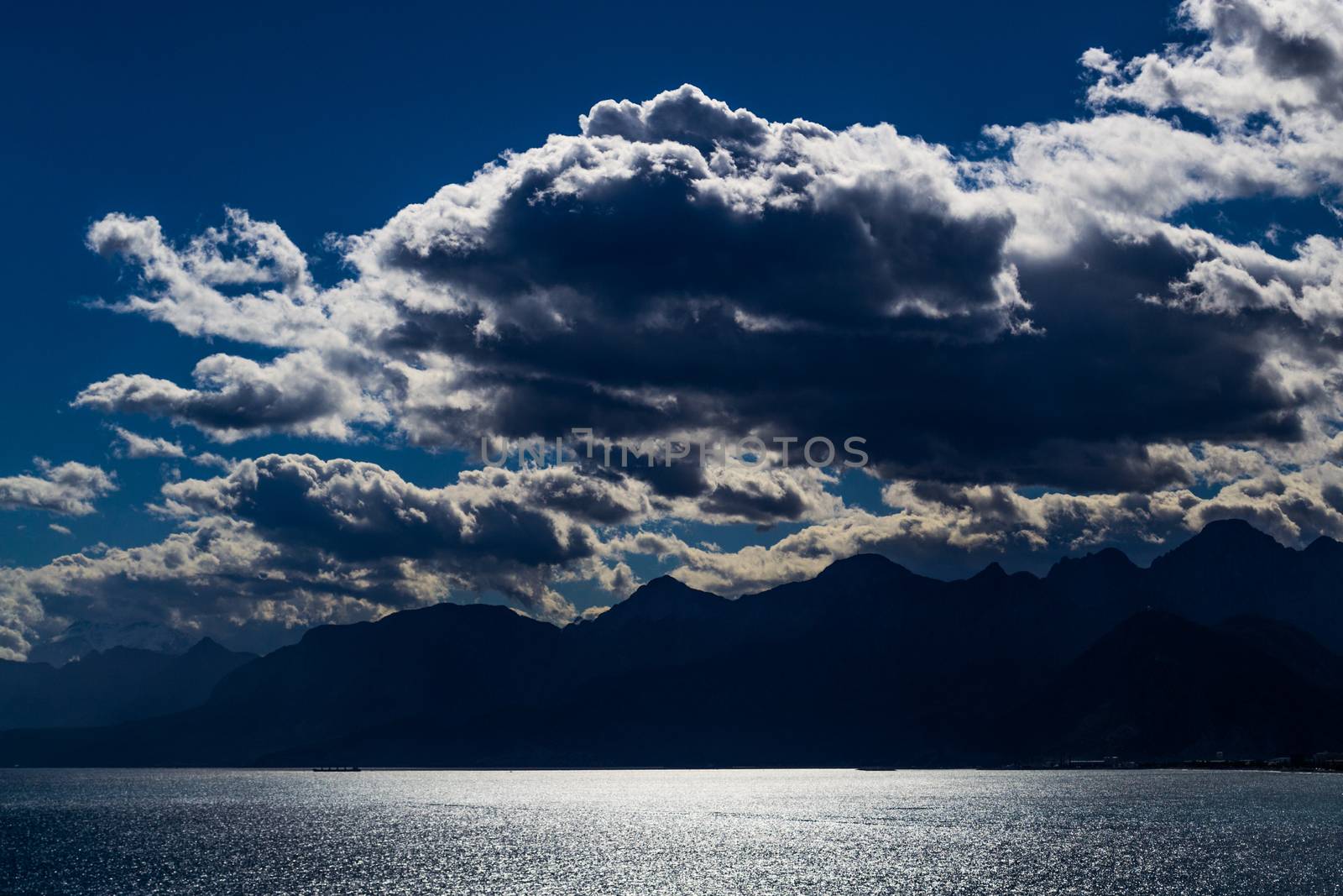 Clouds over the sea by rmbarricarte
