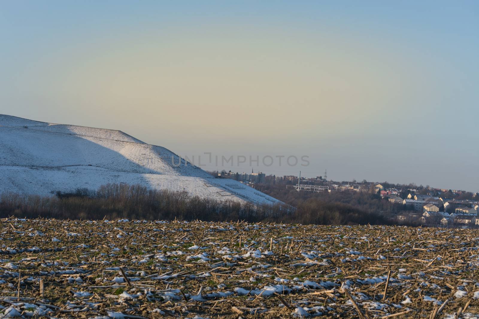 Snowy Mountain a landfill, dump in the winter.