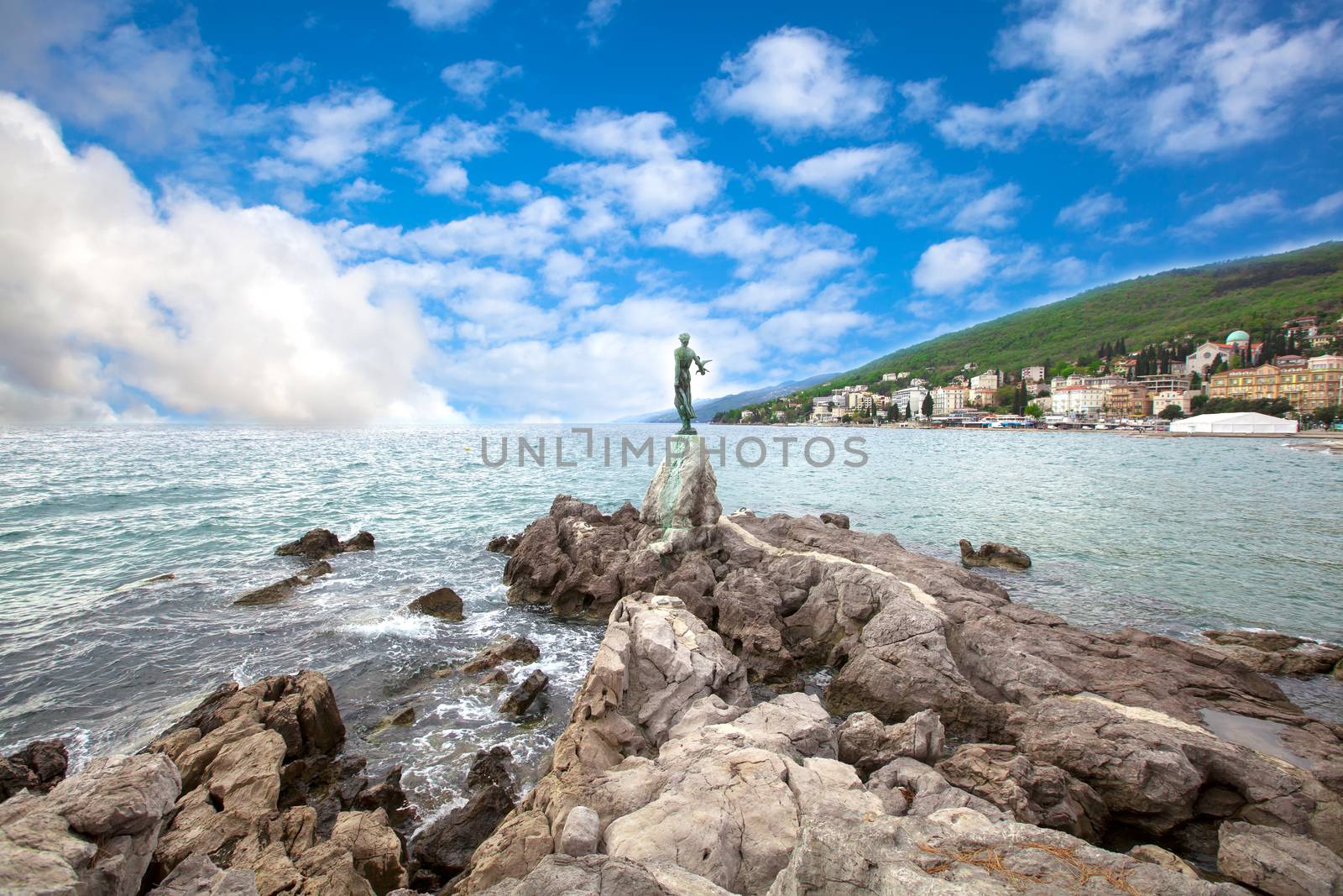 Opatija in Croatia. Sculpture of the woman with the sea. by motorolka