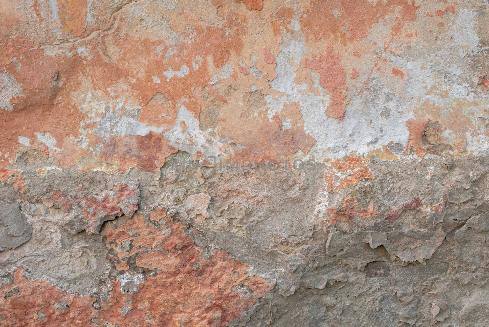 fragment of a concrete wall, which has undergone deformation due to prolonged exposure to various climatic conditions