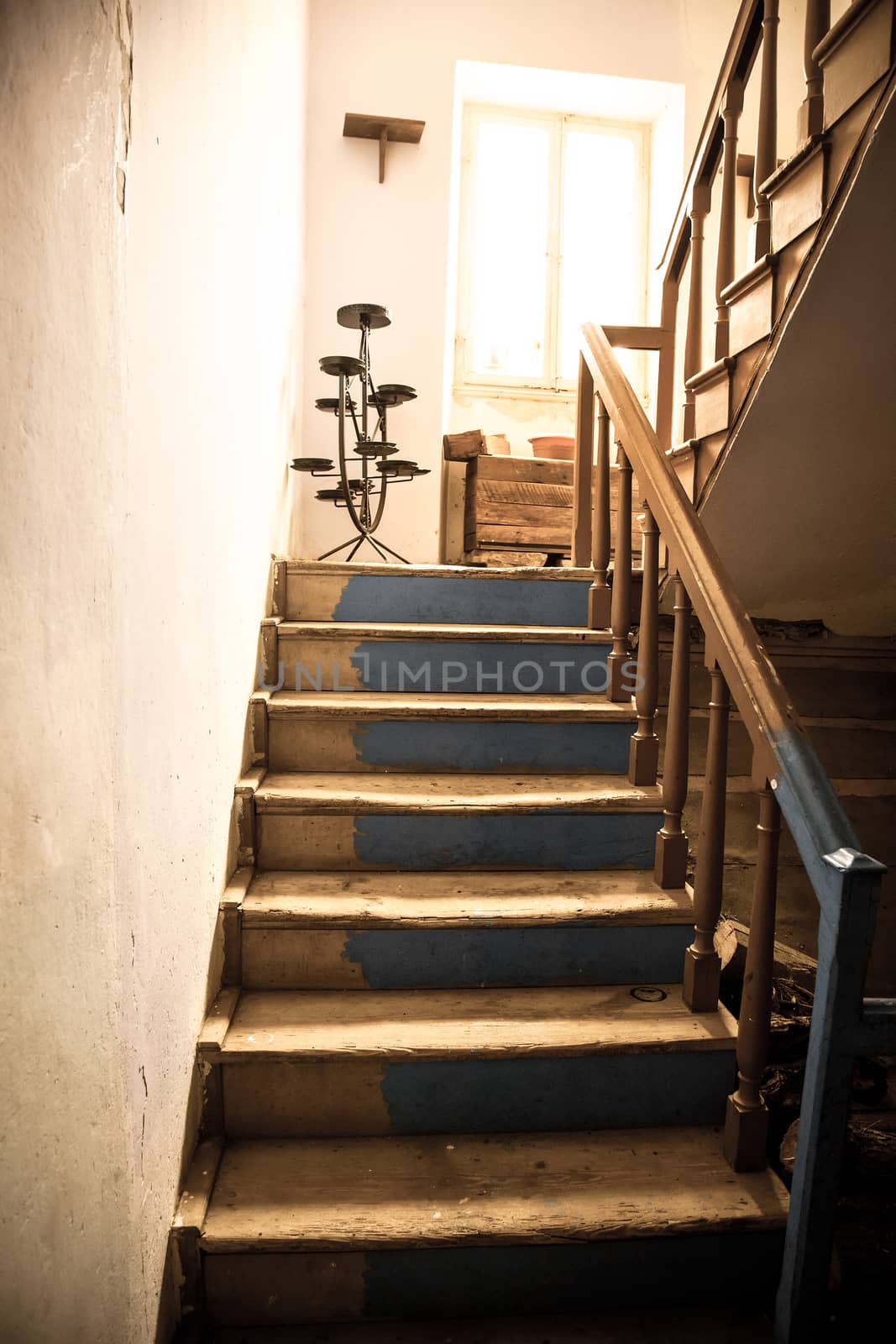 Vintage stairs, selective focus on the wooden steps.