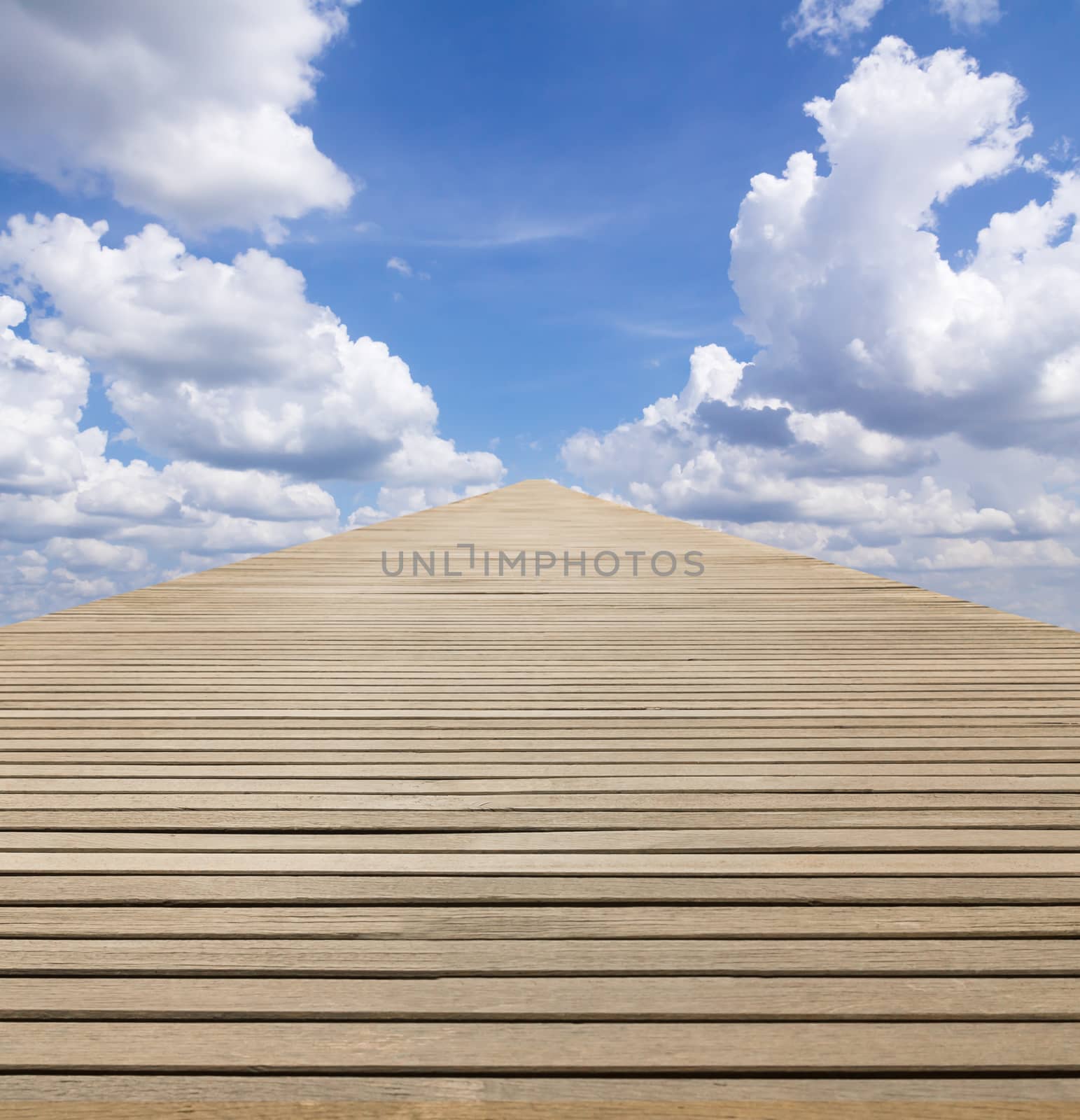 Wood walkway to blue sky at under cloudy
